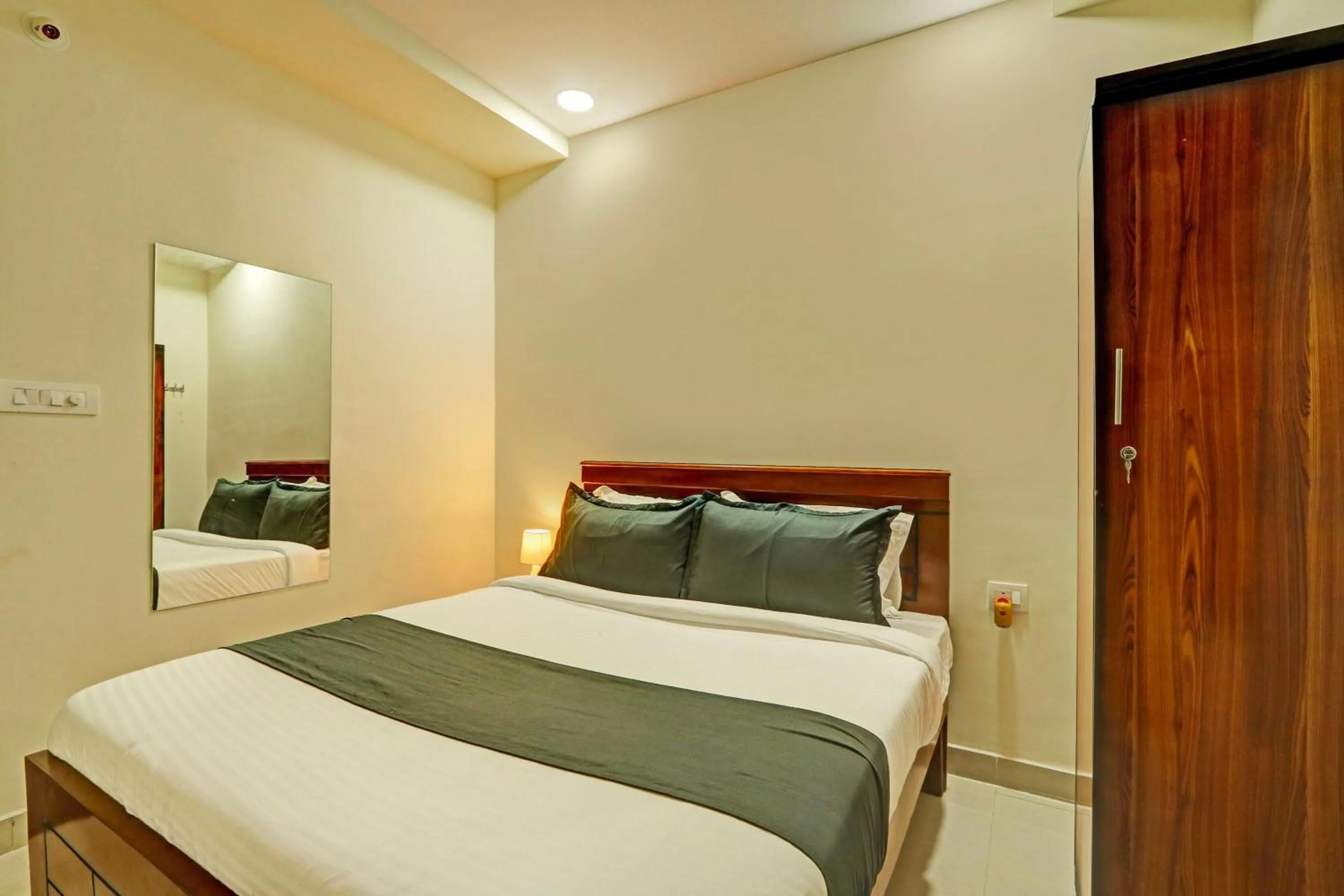 Bedroom in Hotel O JVP Hotels