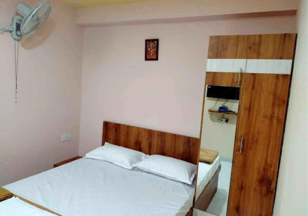 Bed in Mandara Comforts Hotel