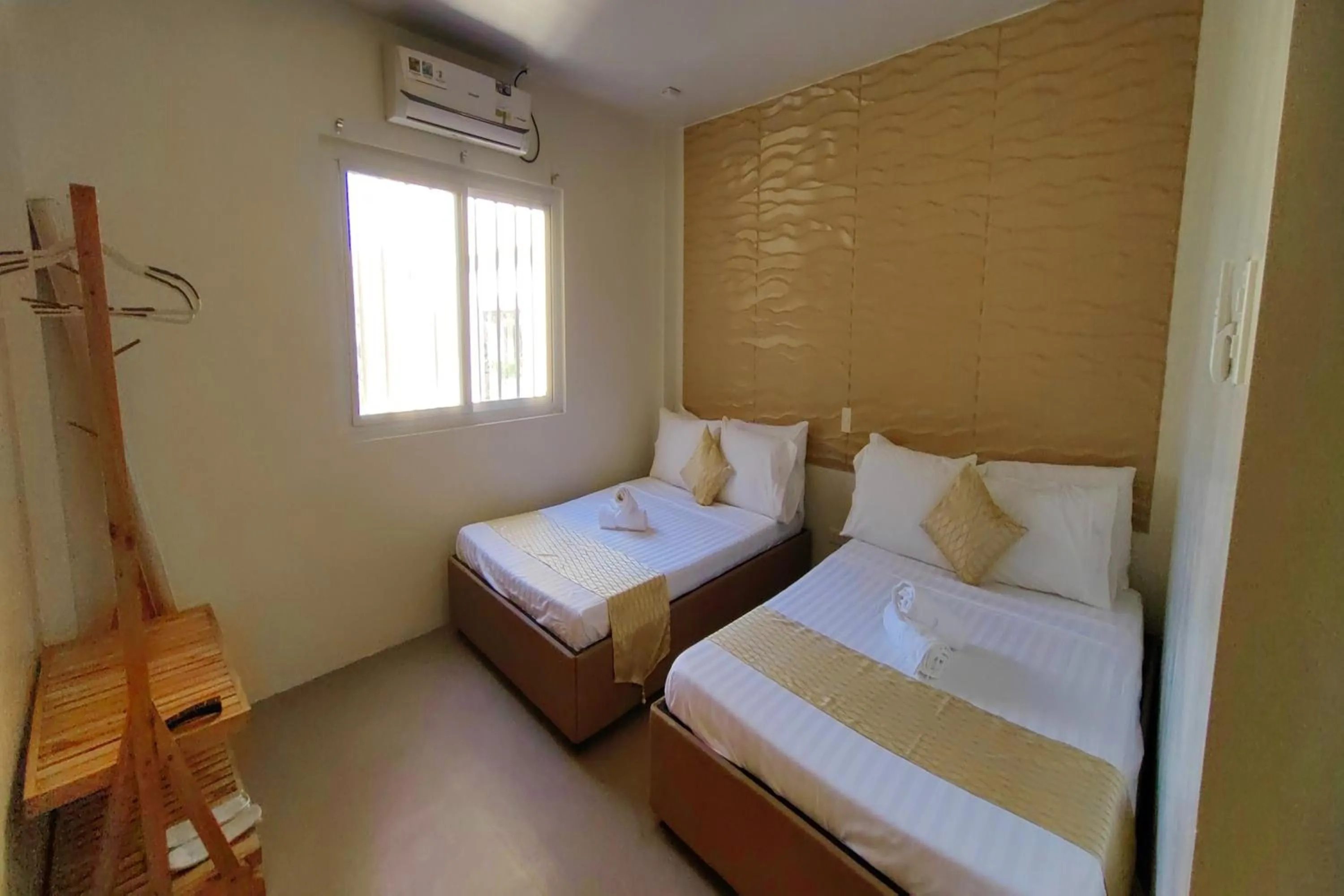 Bed in Manuela Suites Puerto Princesa near Airport