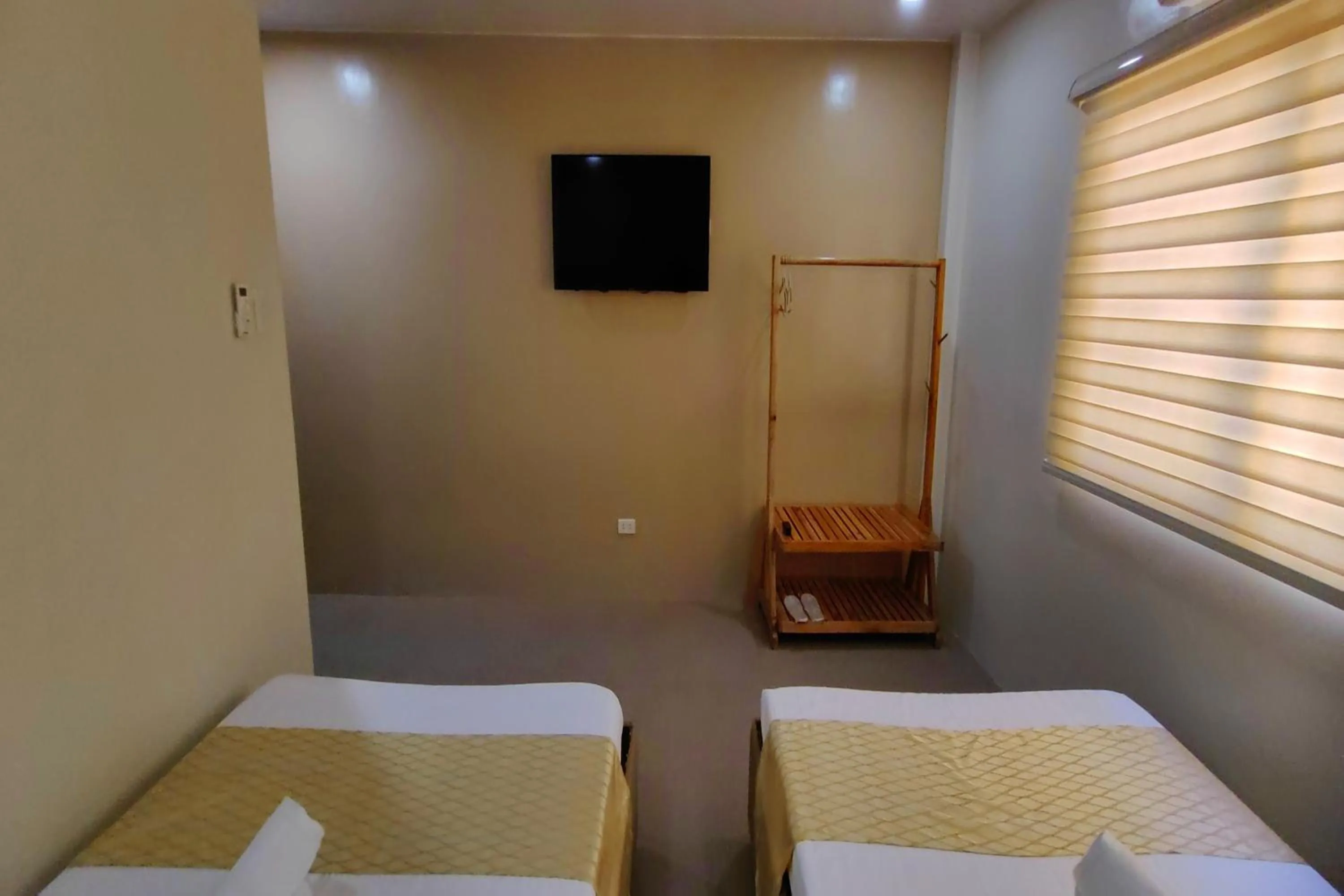 Bed in Manuela Suites Puerto Princesa near Airport
