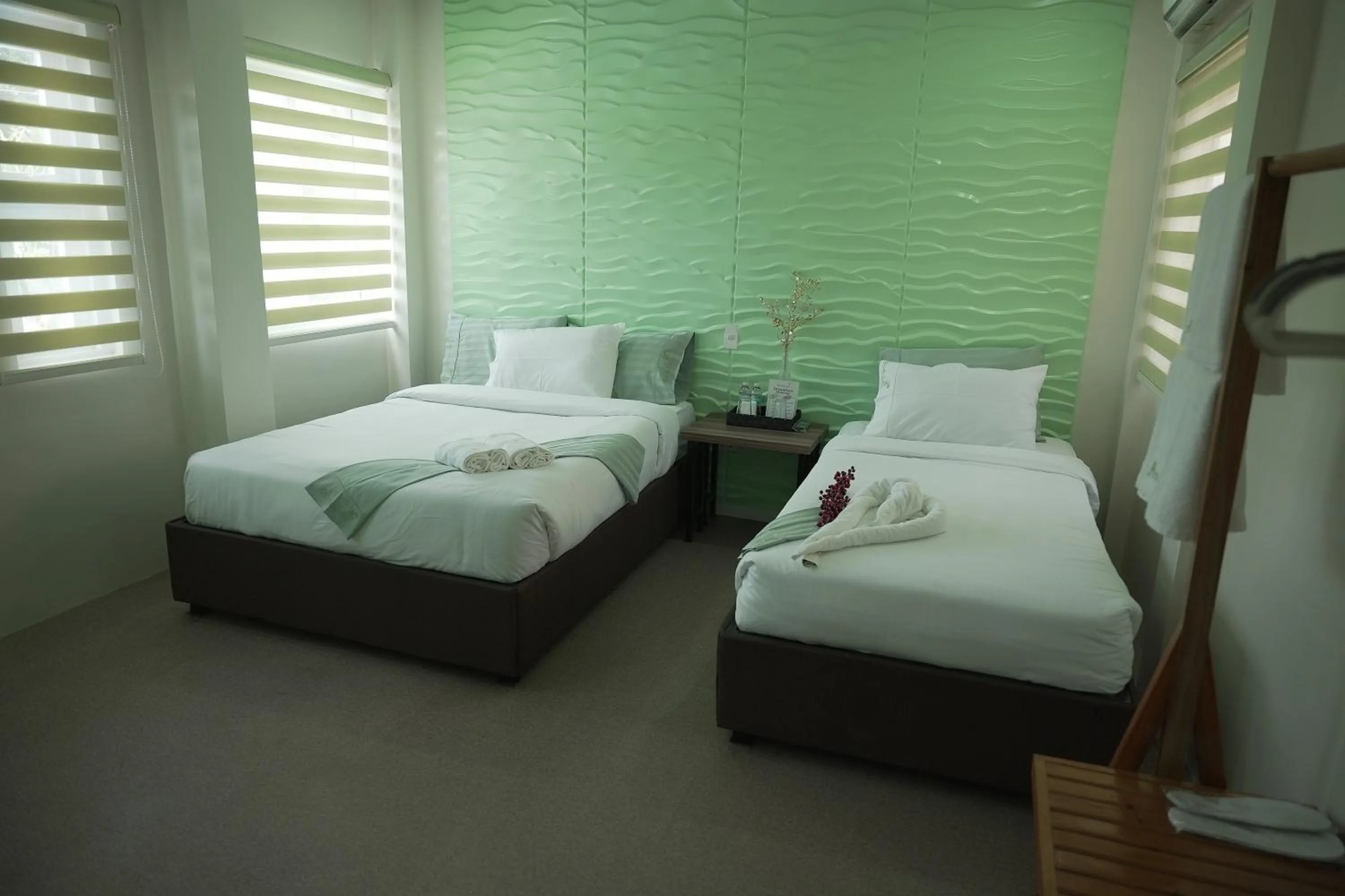 Bed in Manuela Suites Puerto Princesa near Airport