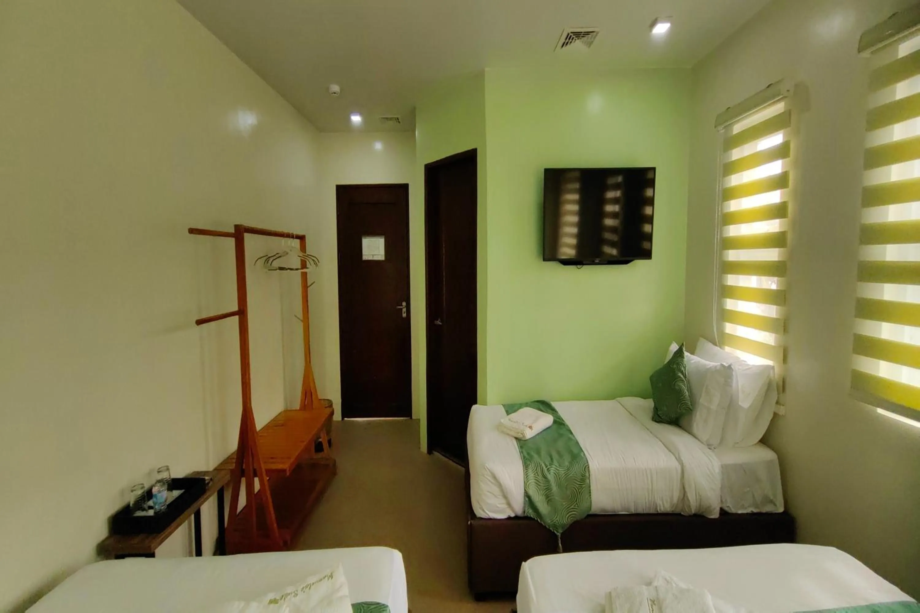 Bed in Manuela Suites Puerto Princesa near Airport