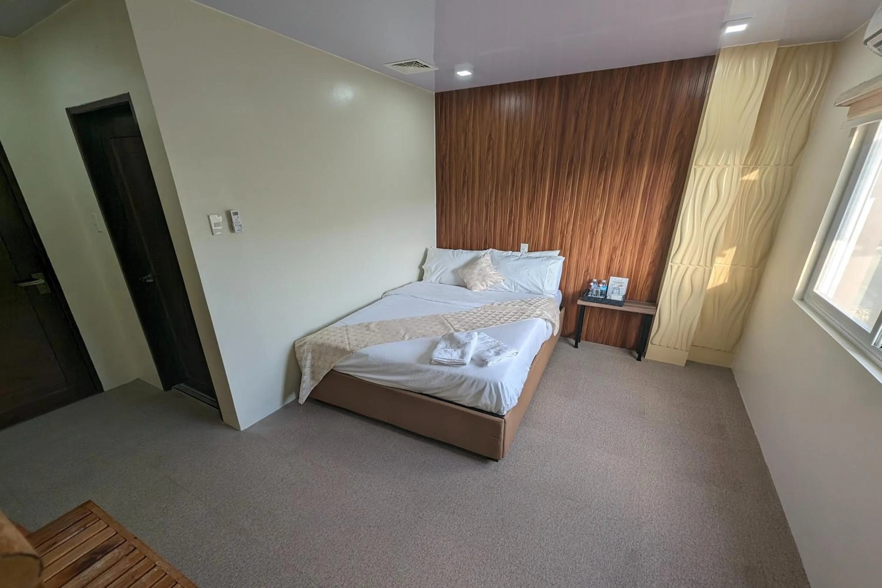 Bed in Manuela Suites Puerto Princesa near Airport