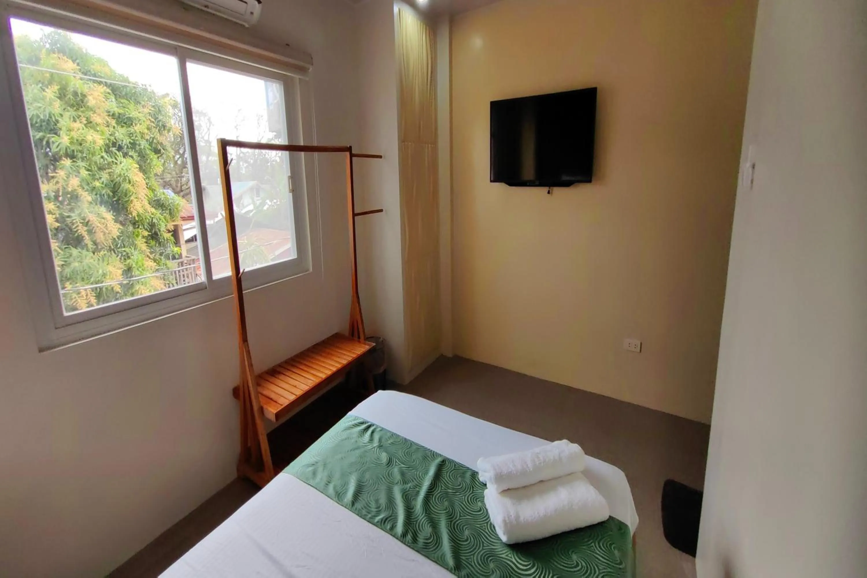 Bed in Manuela Suites Puerto Princesa near Airport
