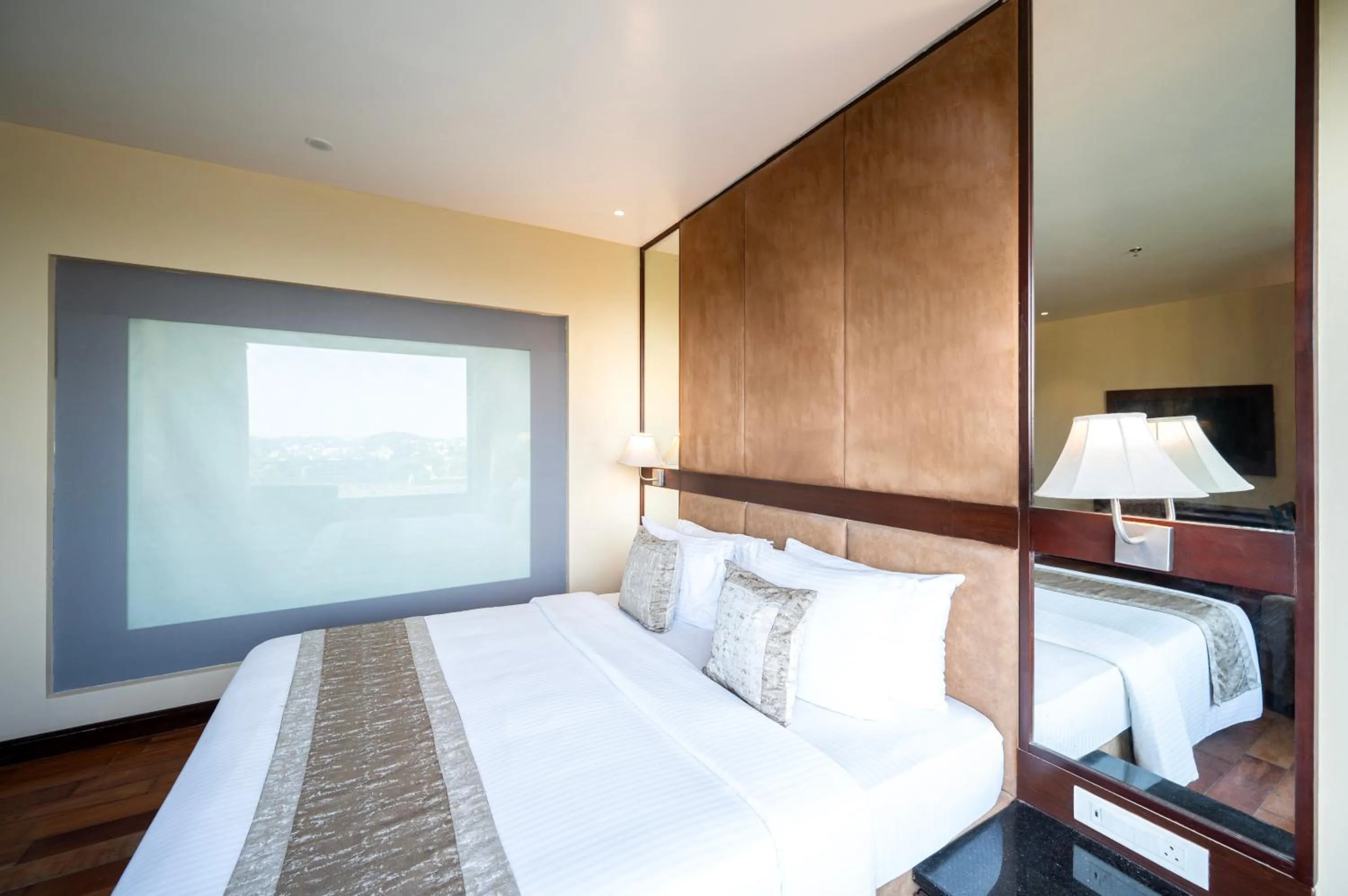 Bed in Essentia Luxury Resort & Spa Udaipur