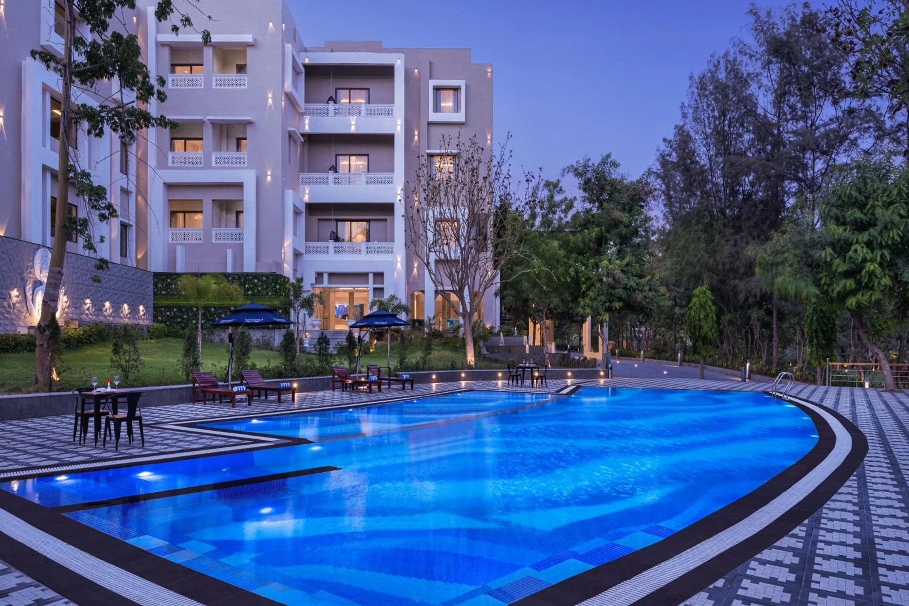 Swimming pool in Essentia Luxury Resort & Spa Udaipur