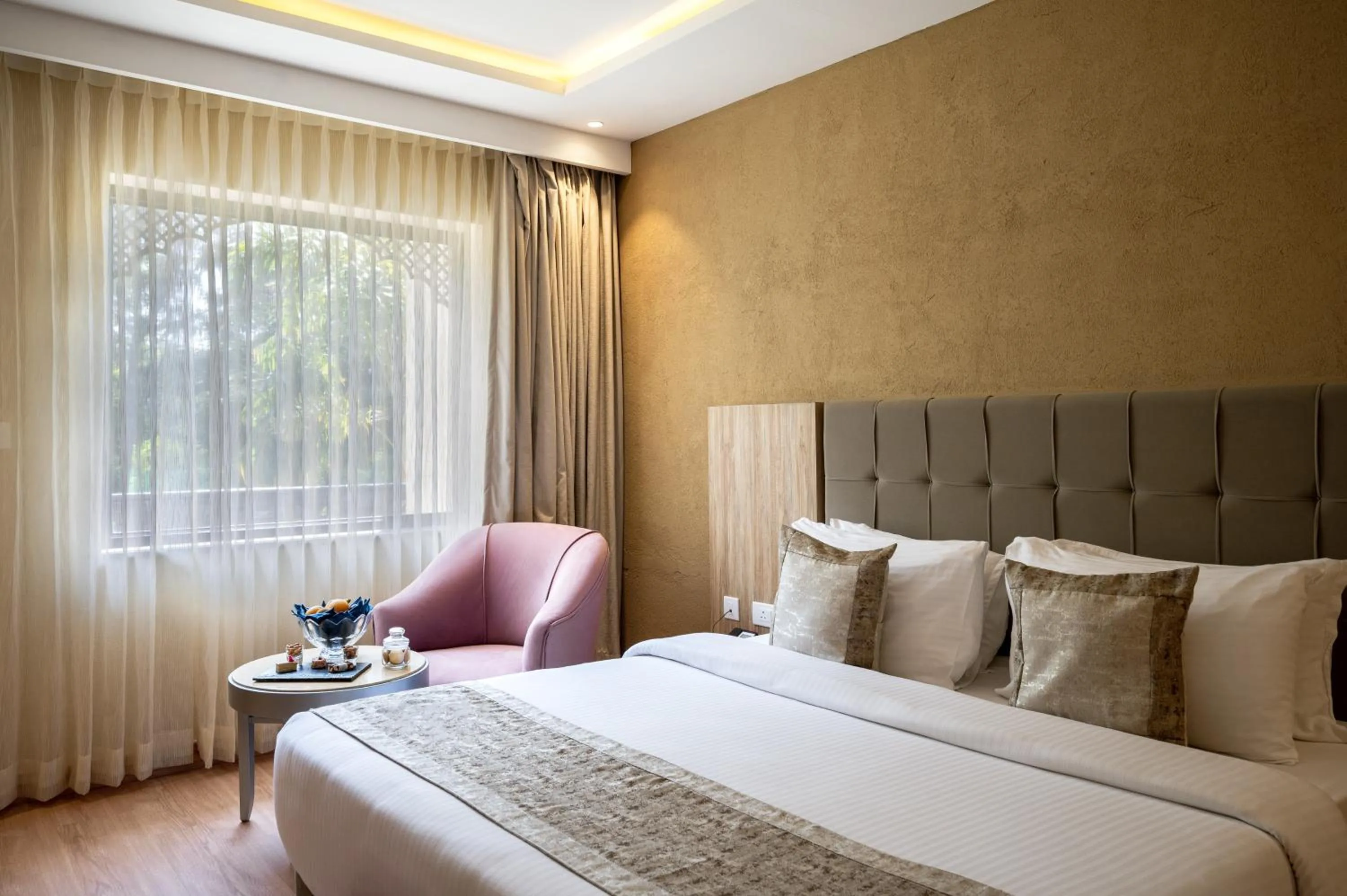 Seating area, Bed in Essentia Luxury Resort & Spa Udaipur