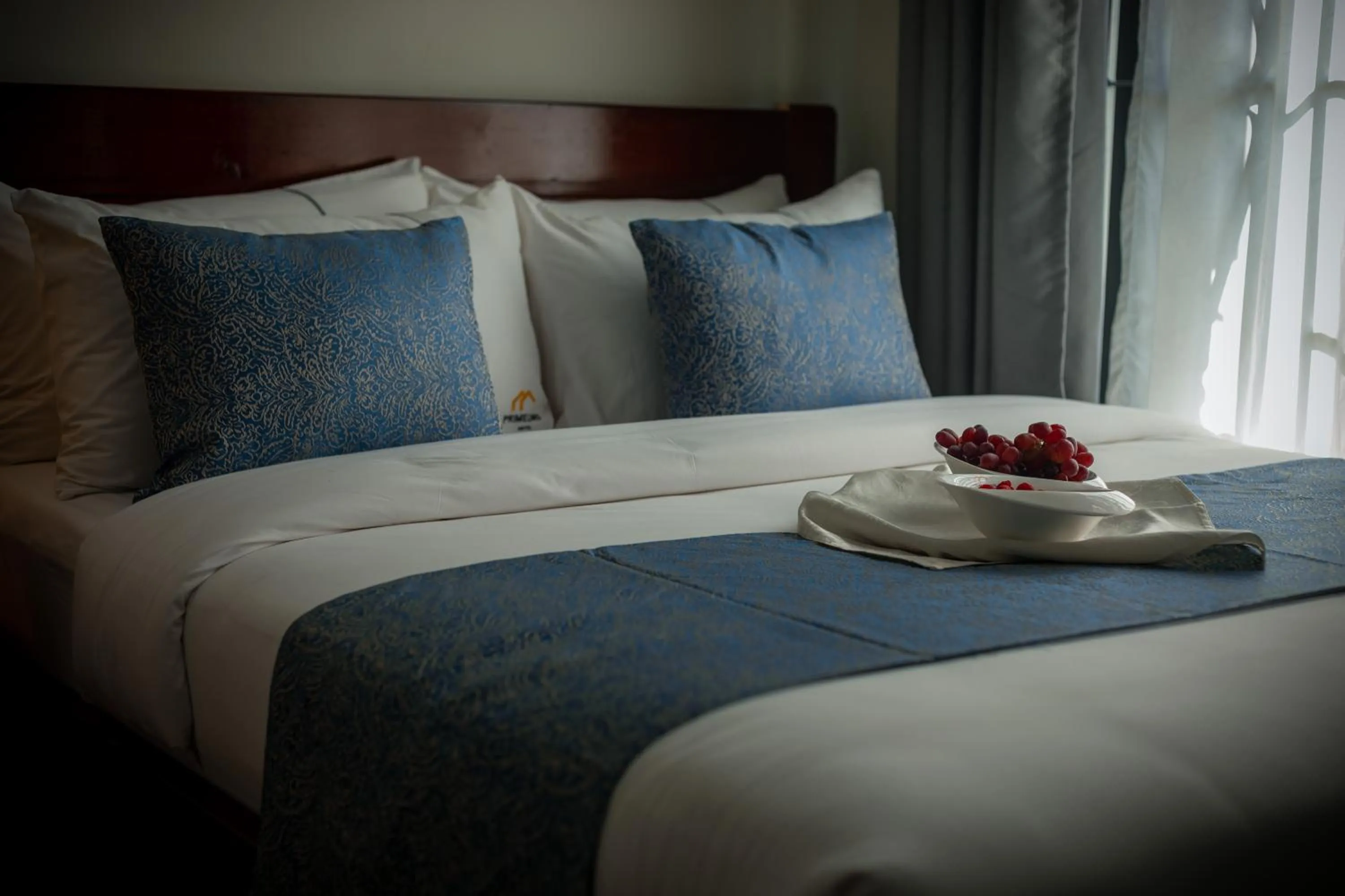 Bed in Primeland Hotel