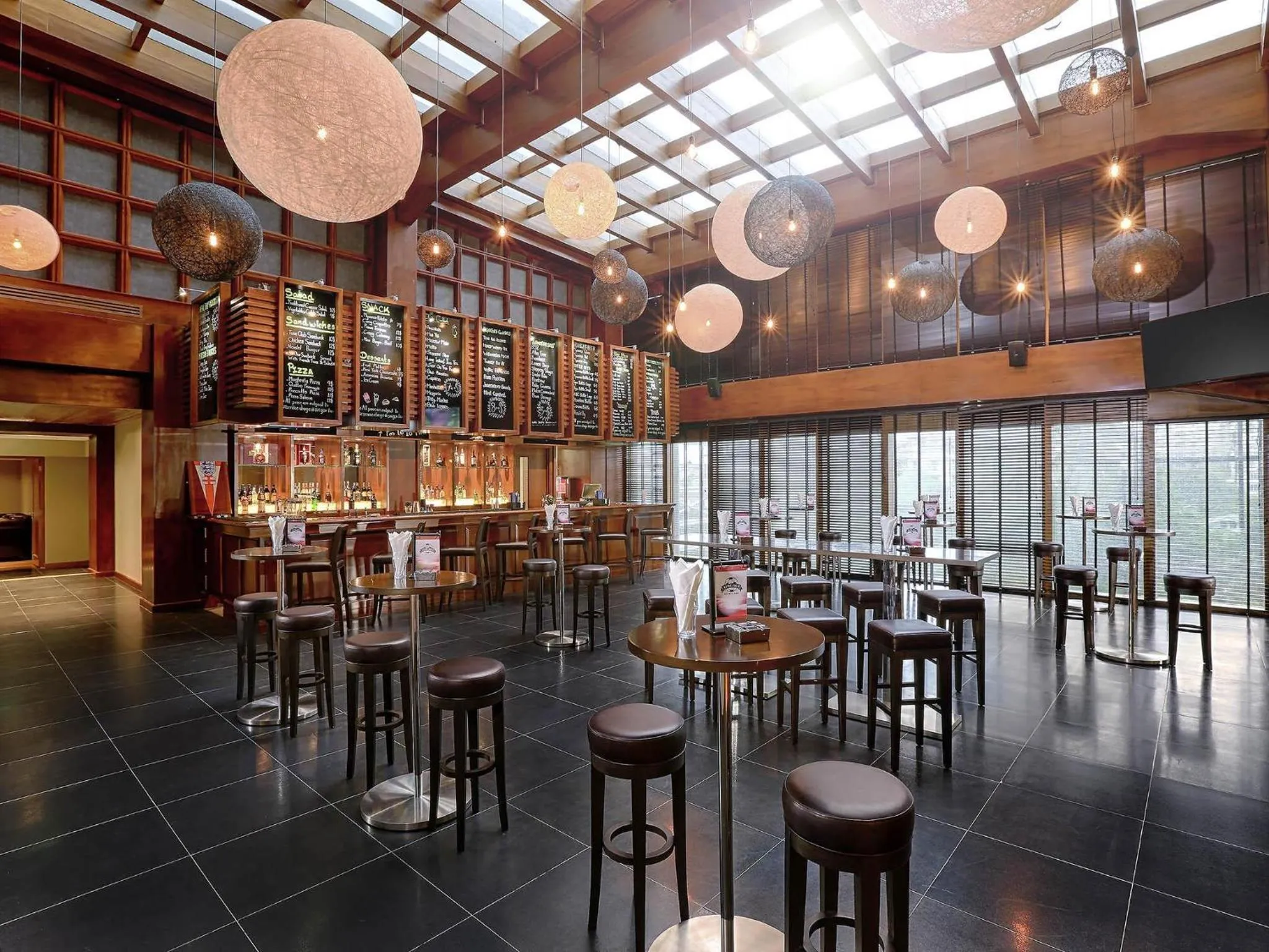 Lounge or bar in Novotel Yangon Max