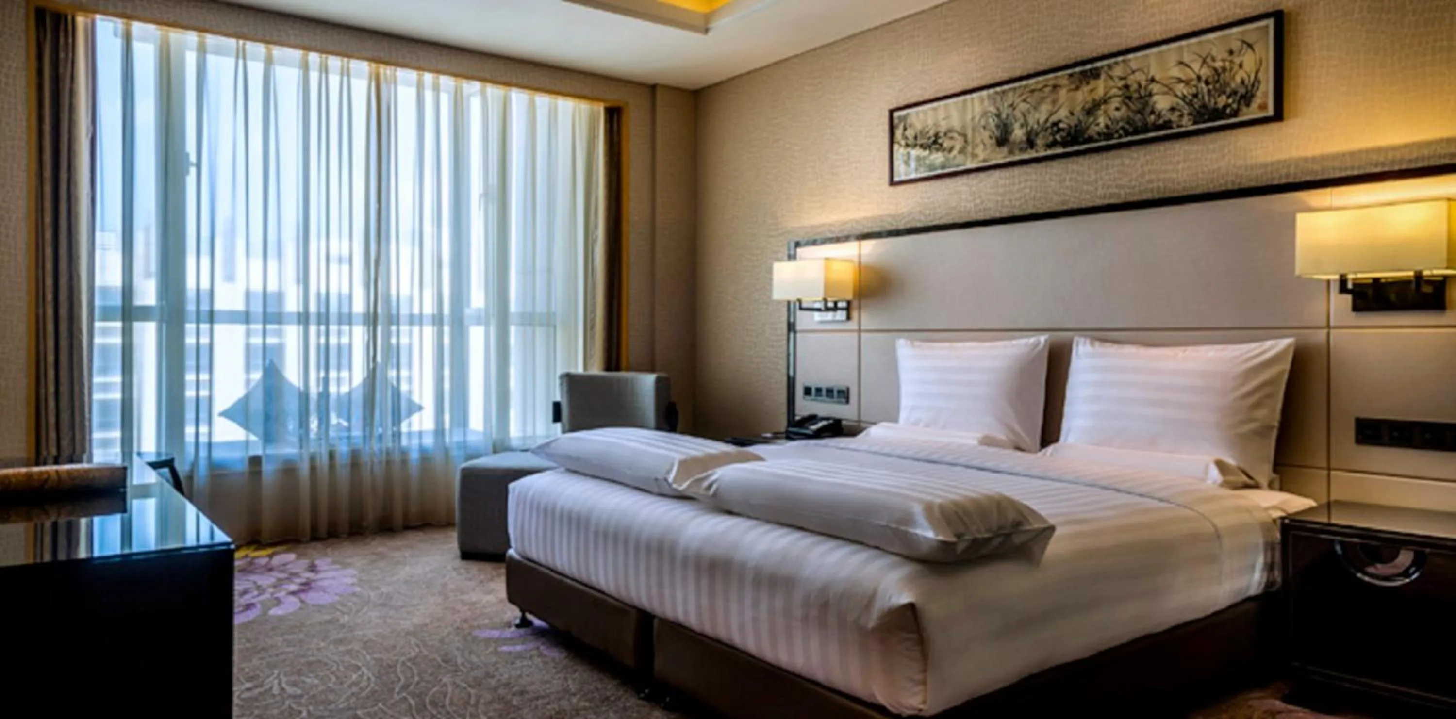 Photo of the whole room in Pullman Qingdao Ziyue