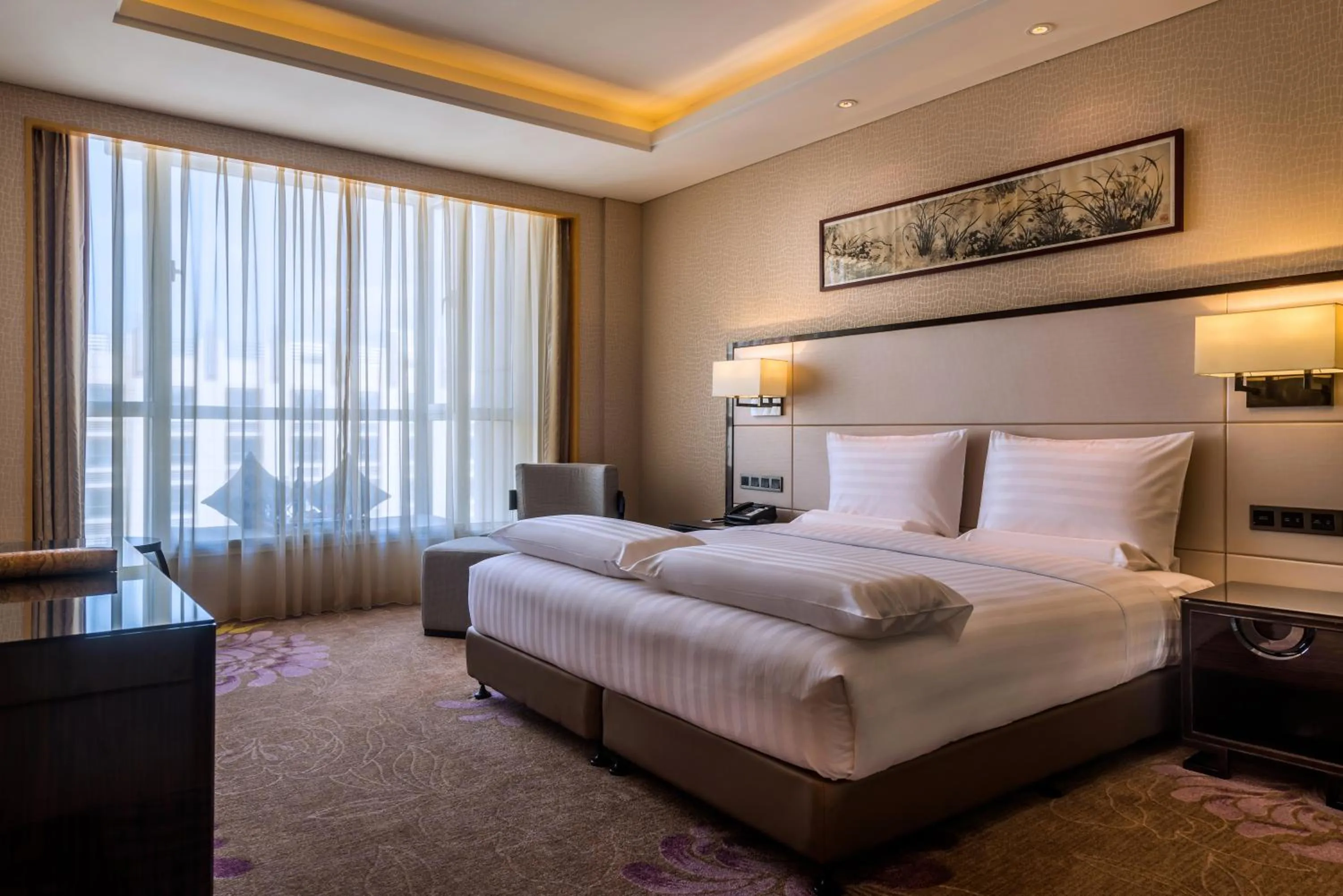 Photo of the whole room in Pullman Qingdao Ziyue