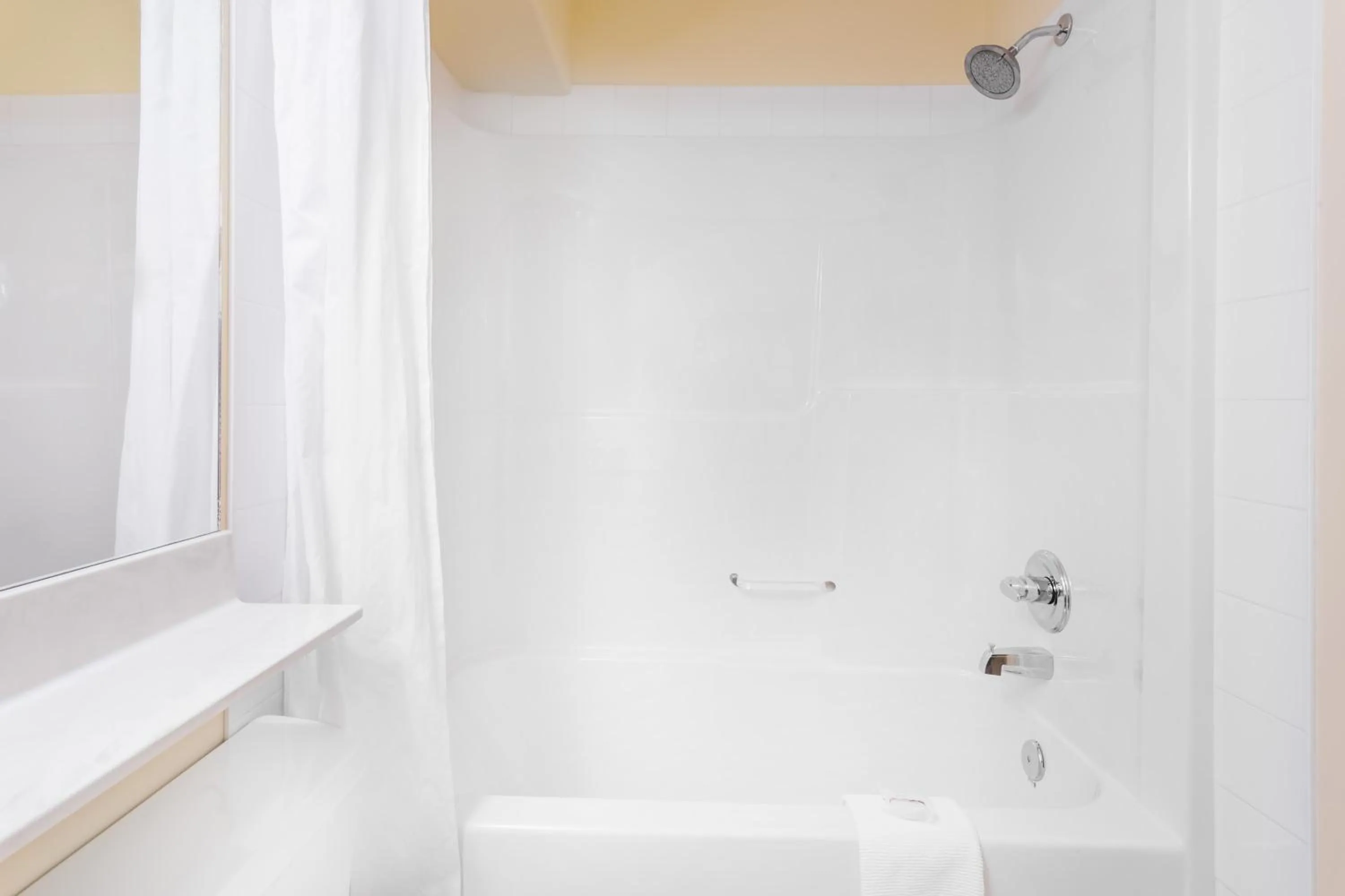 Bathroom in Ramada by Wyndham Hinton