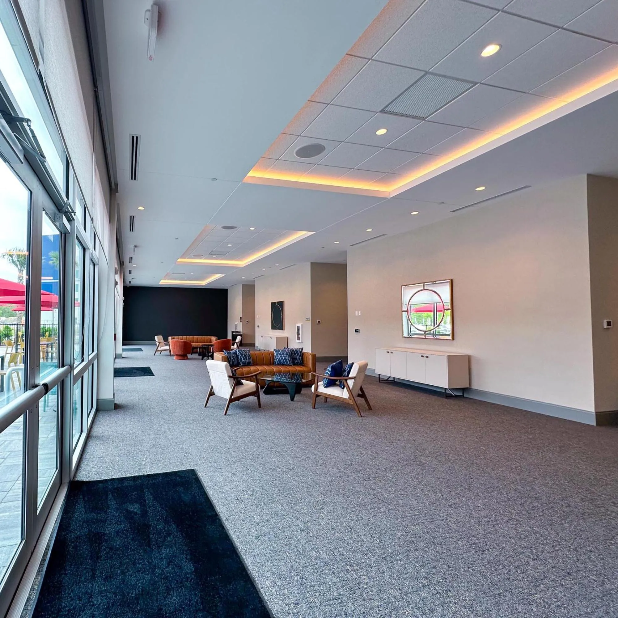 Communal lounge/ TV room in Home2 Suites by Hilton Fort Walton Beach Eglin AirForce Base