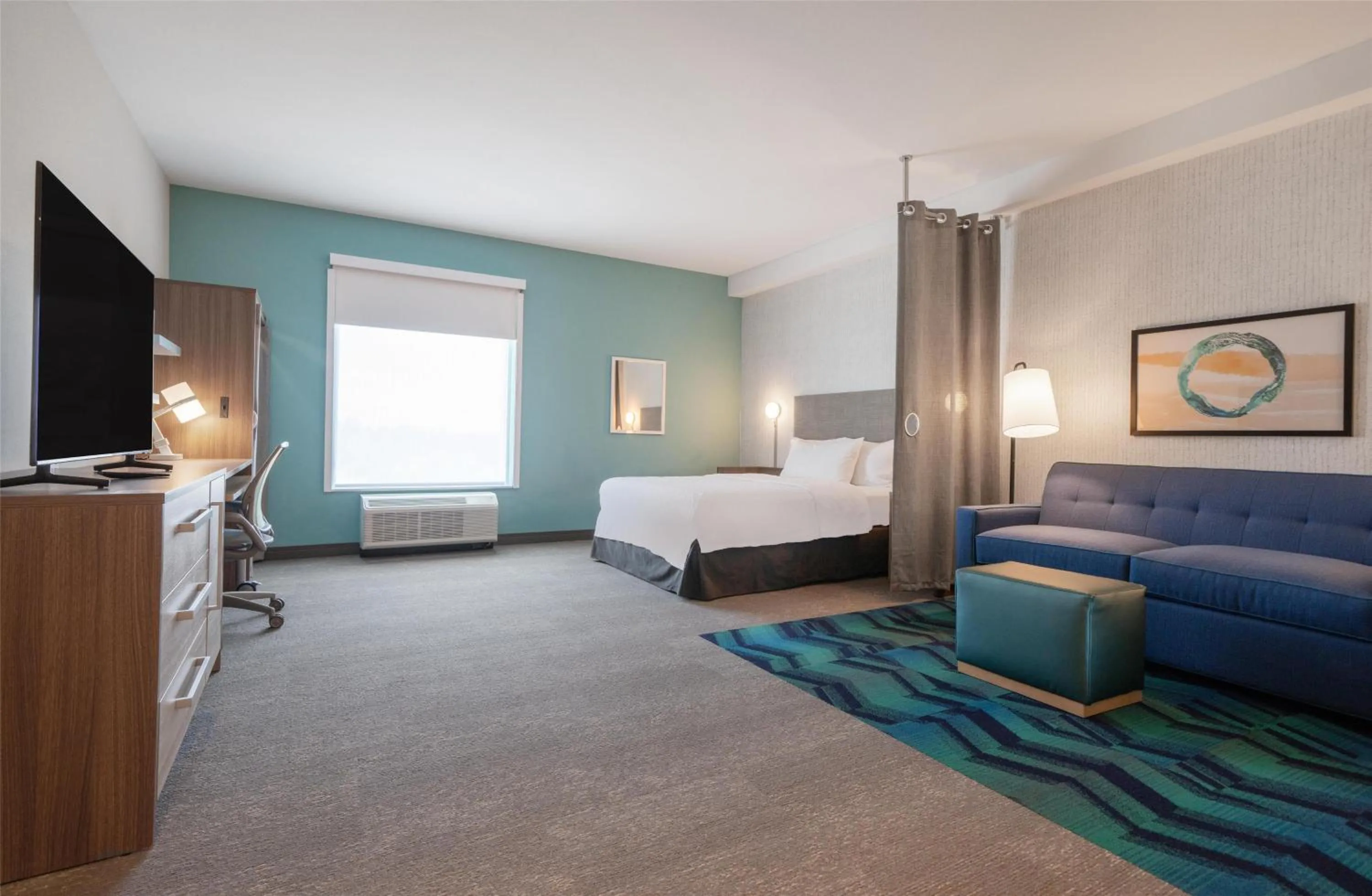 Living room, Bed in Home2 Suites by Hilton Fort Walton Beach Eglin AirForce Base