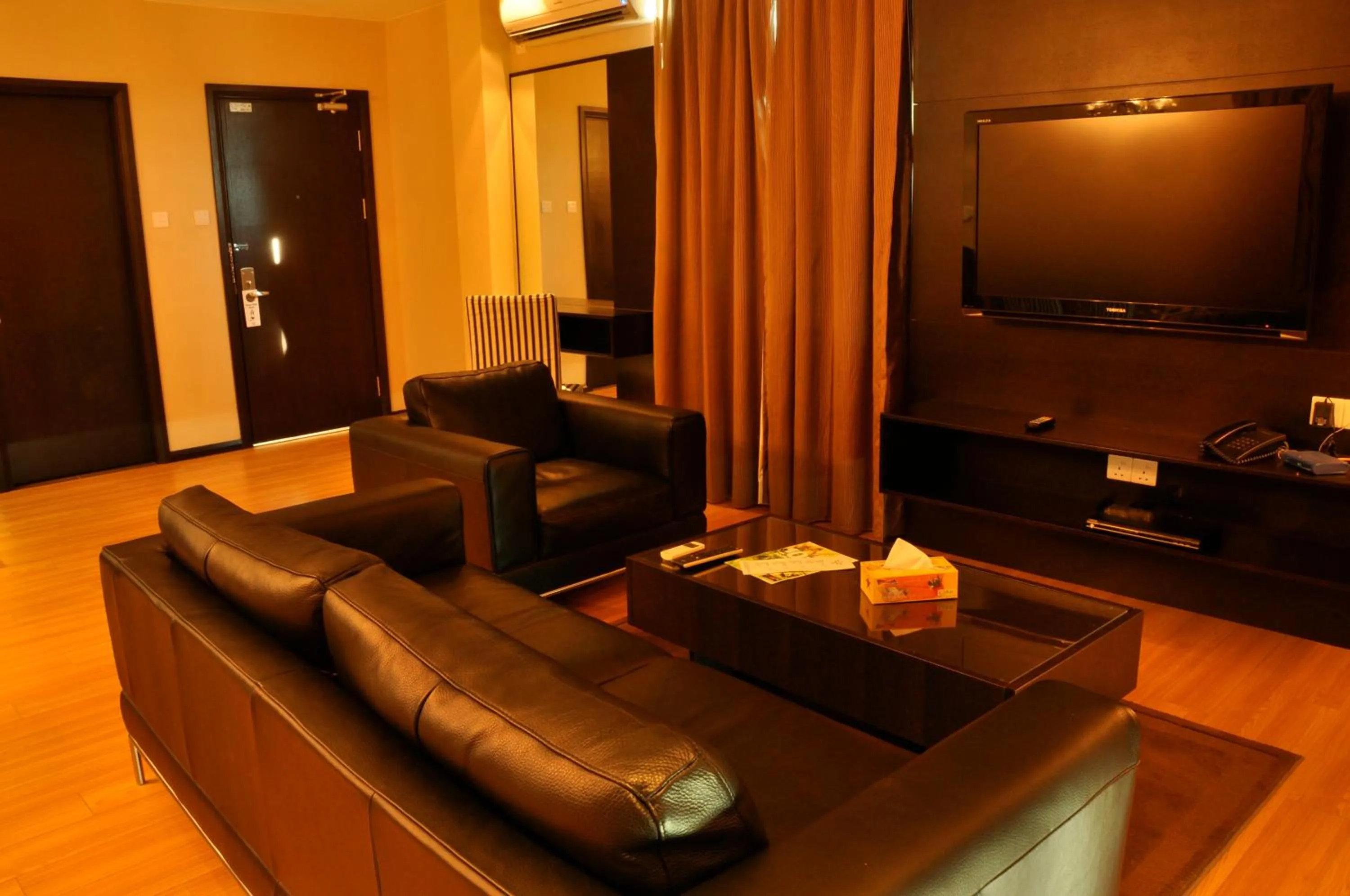 Living room in Tat Place Hotel