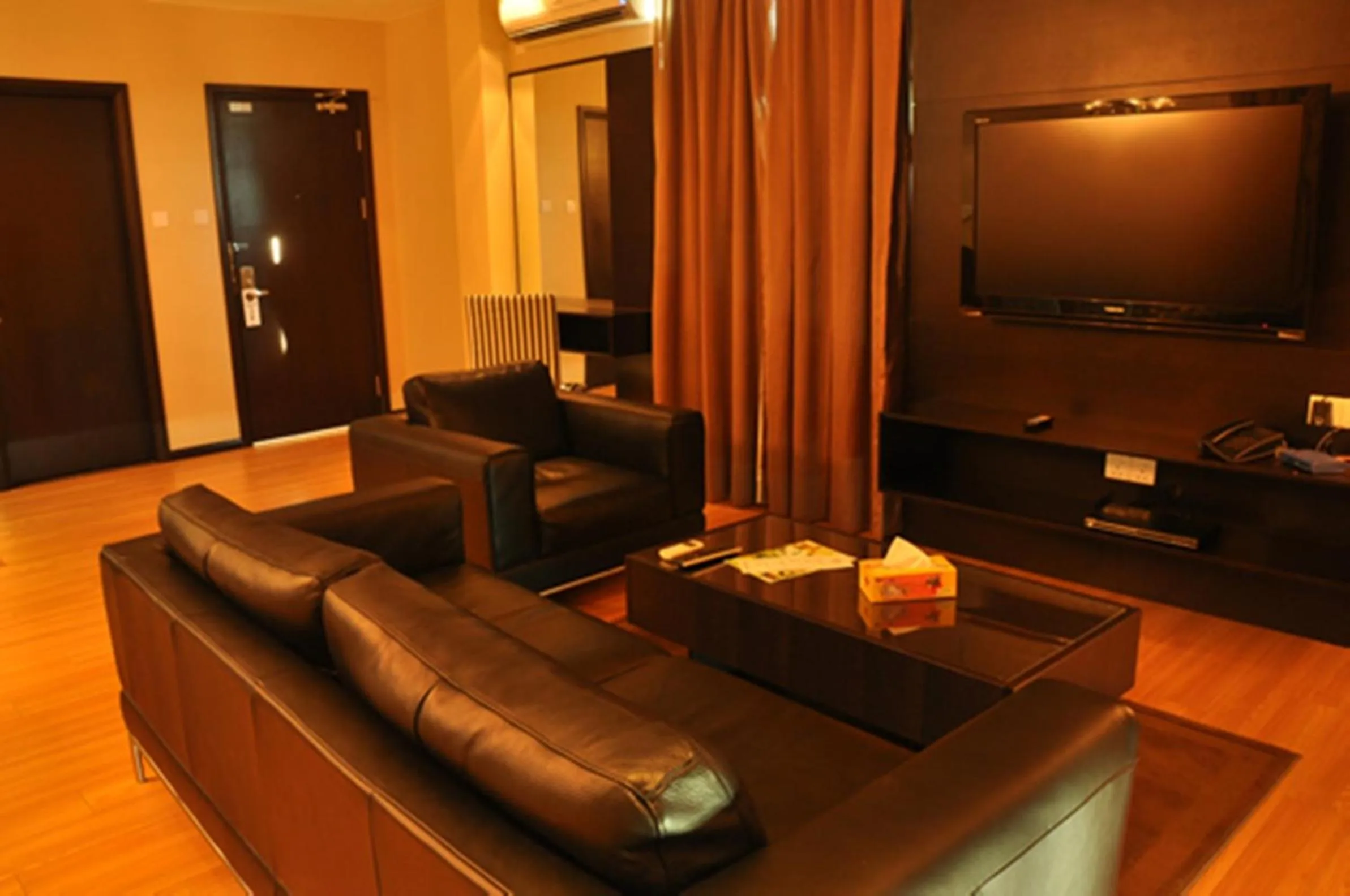 Living room in Tat Place Hotel