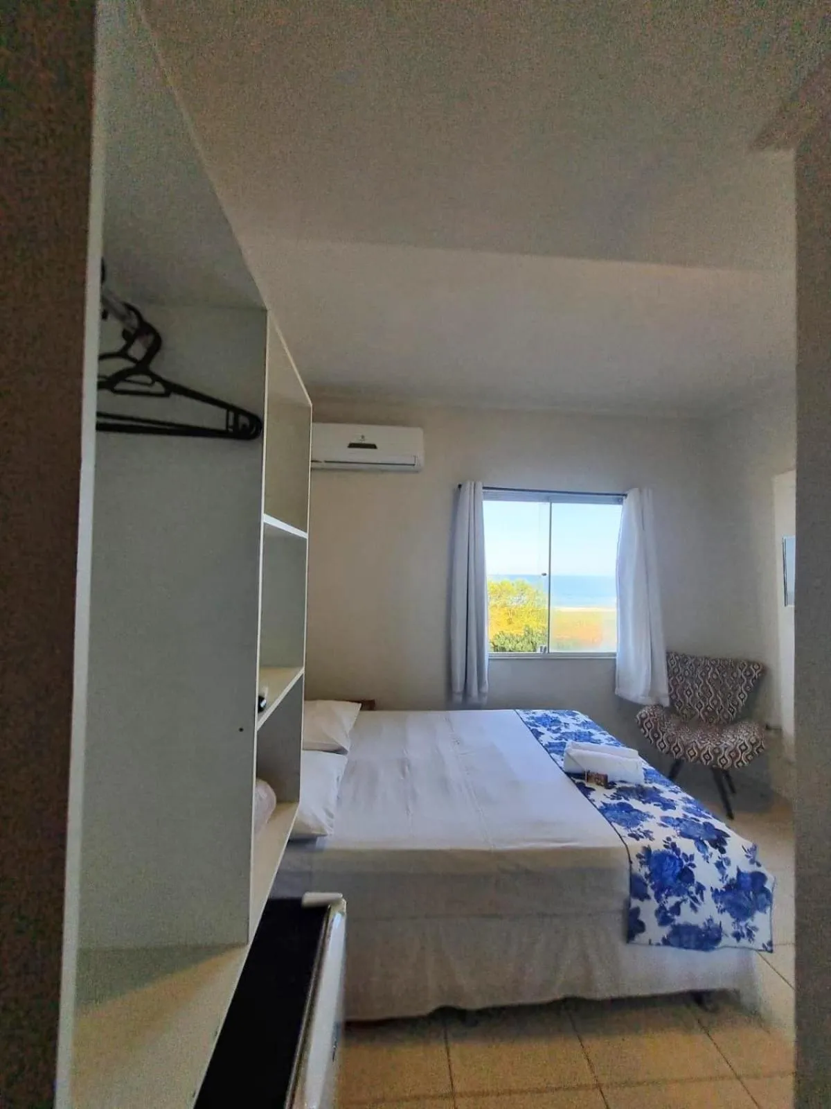 Photo of the whole room, Bed in Terra Nova Cabo Frio Front Beach