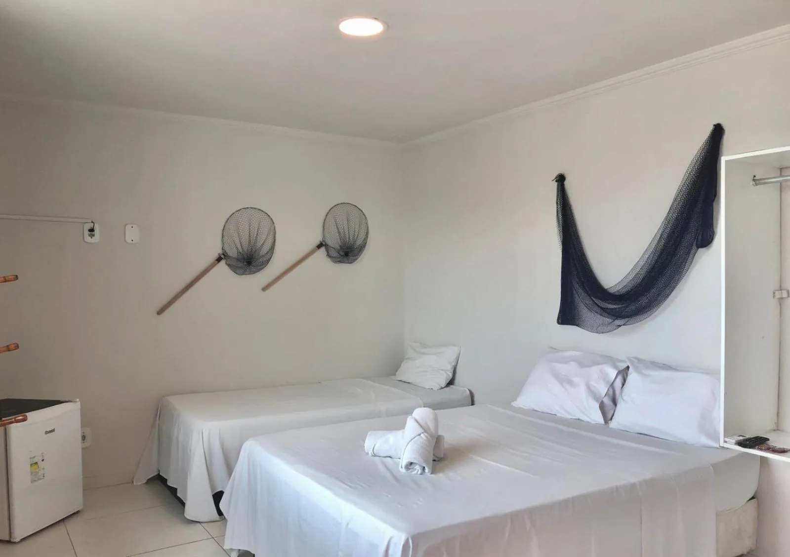 Photo of the whole room, Bed in Terra Nova Cabo Frio Front Beach