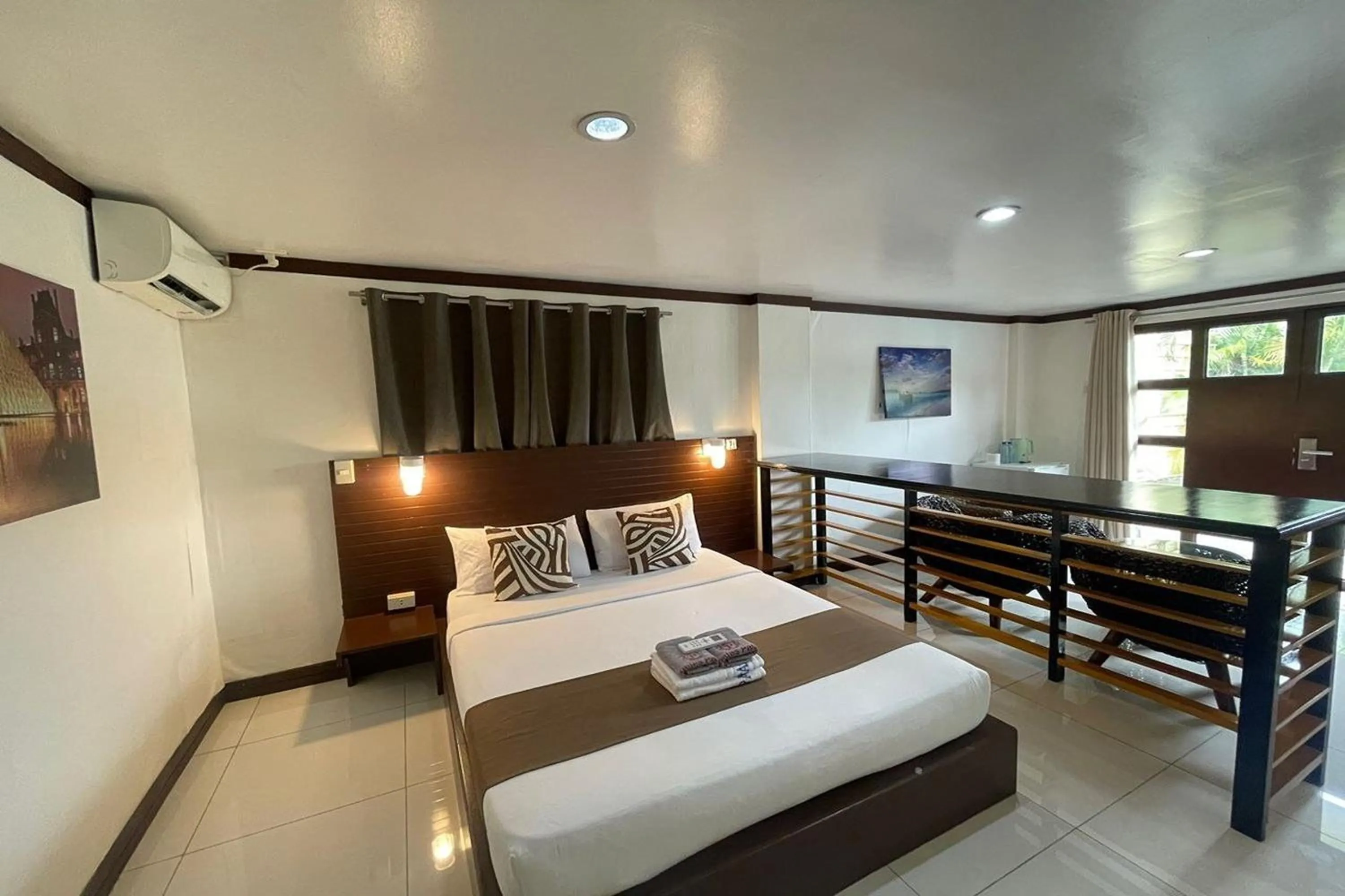 Bed in Angeles Palace Hotel