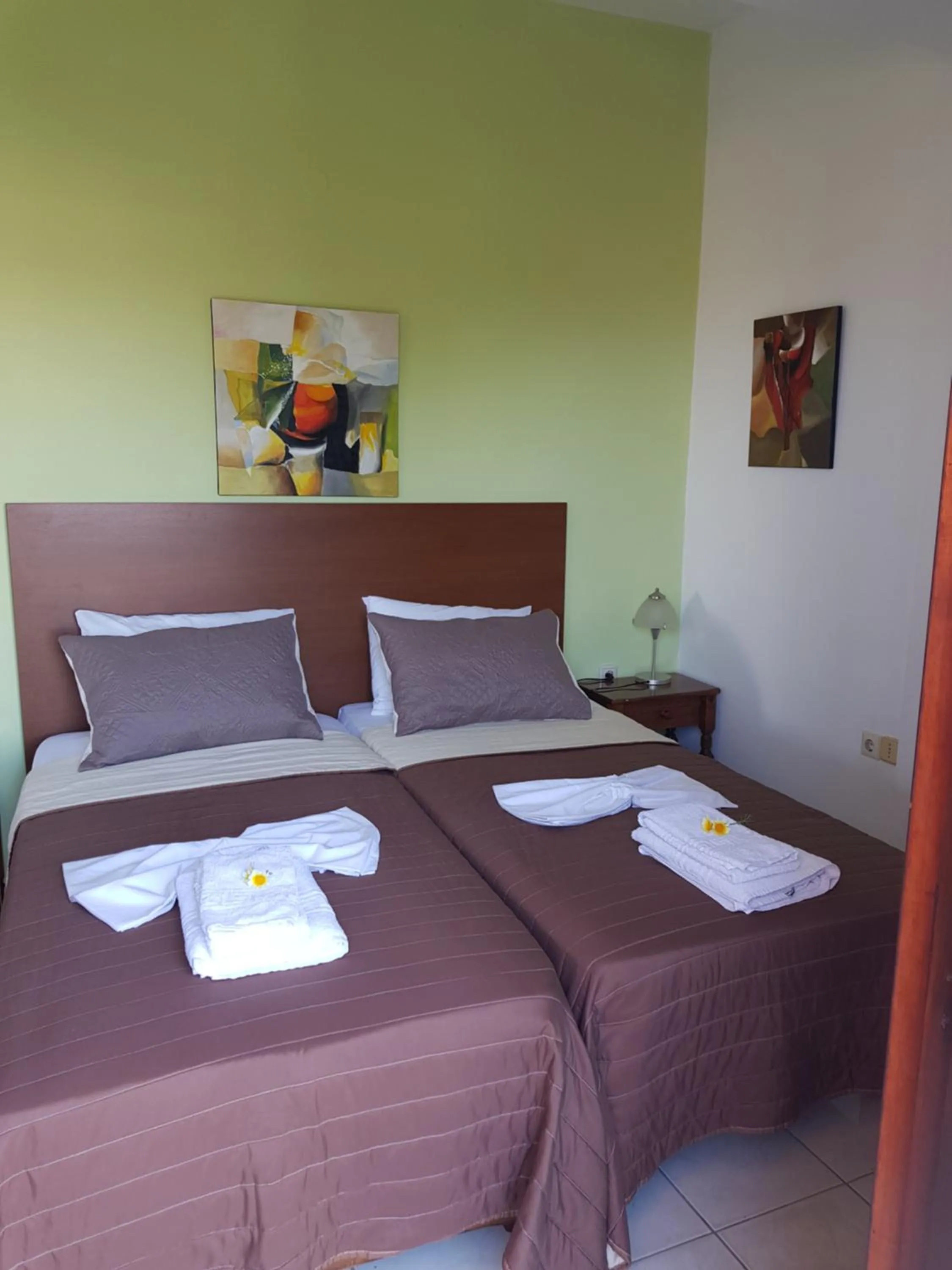 Bed in Angela Apartments