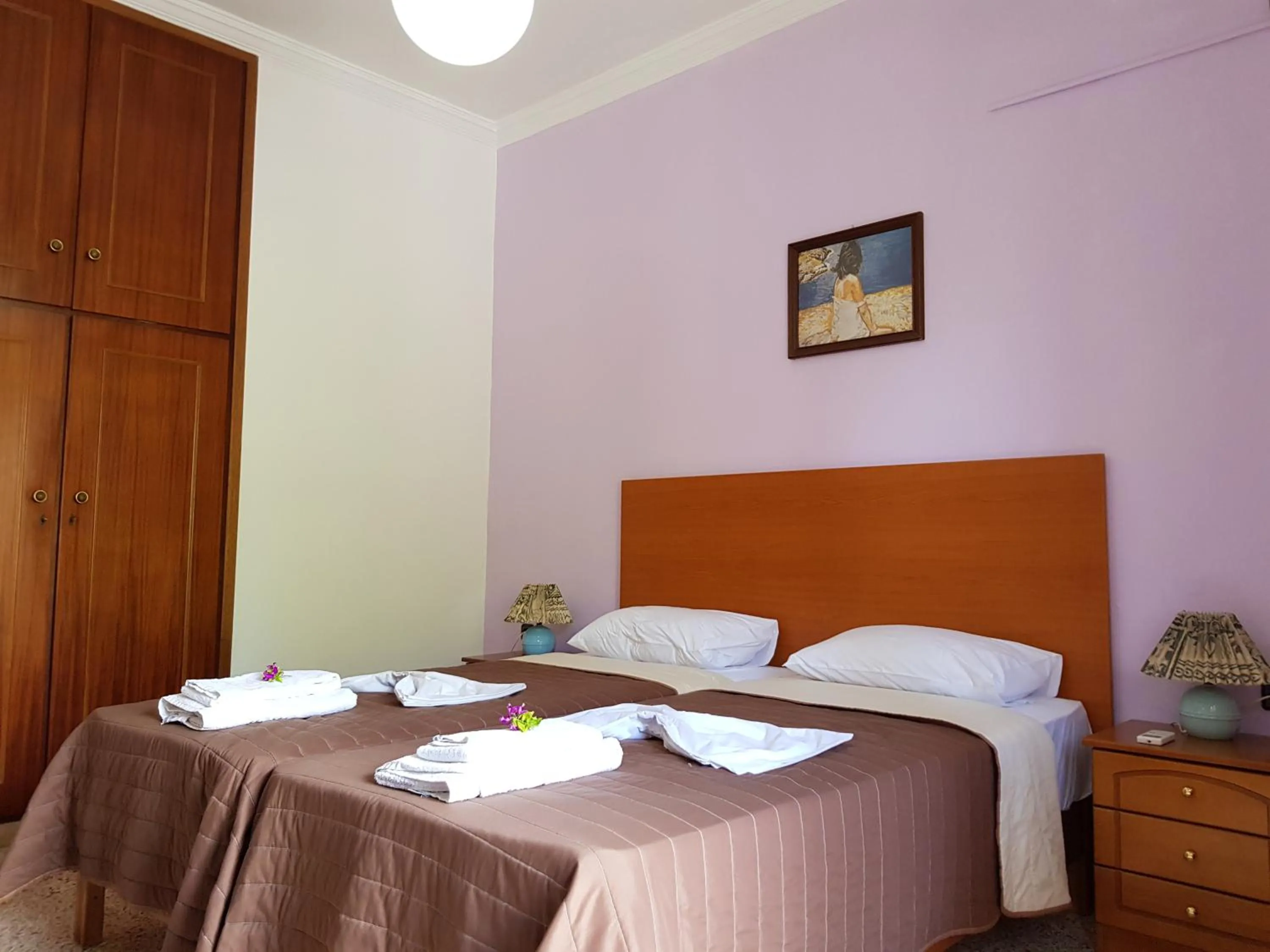 Bed in Angela Apartments