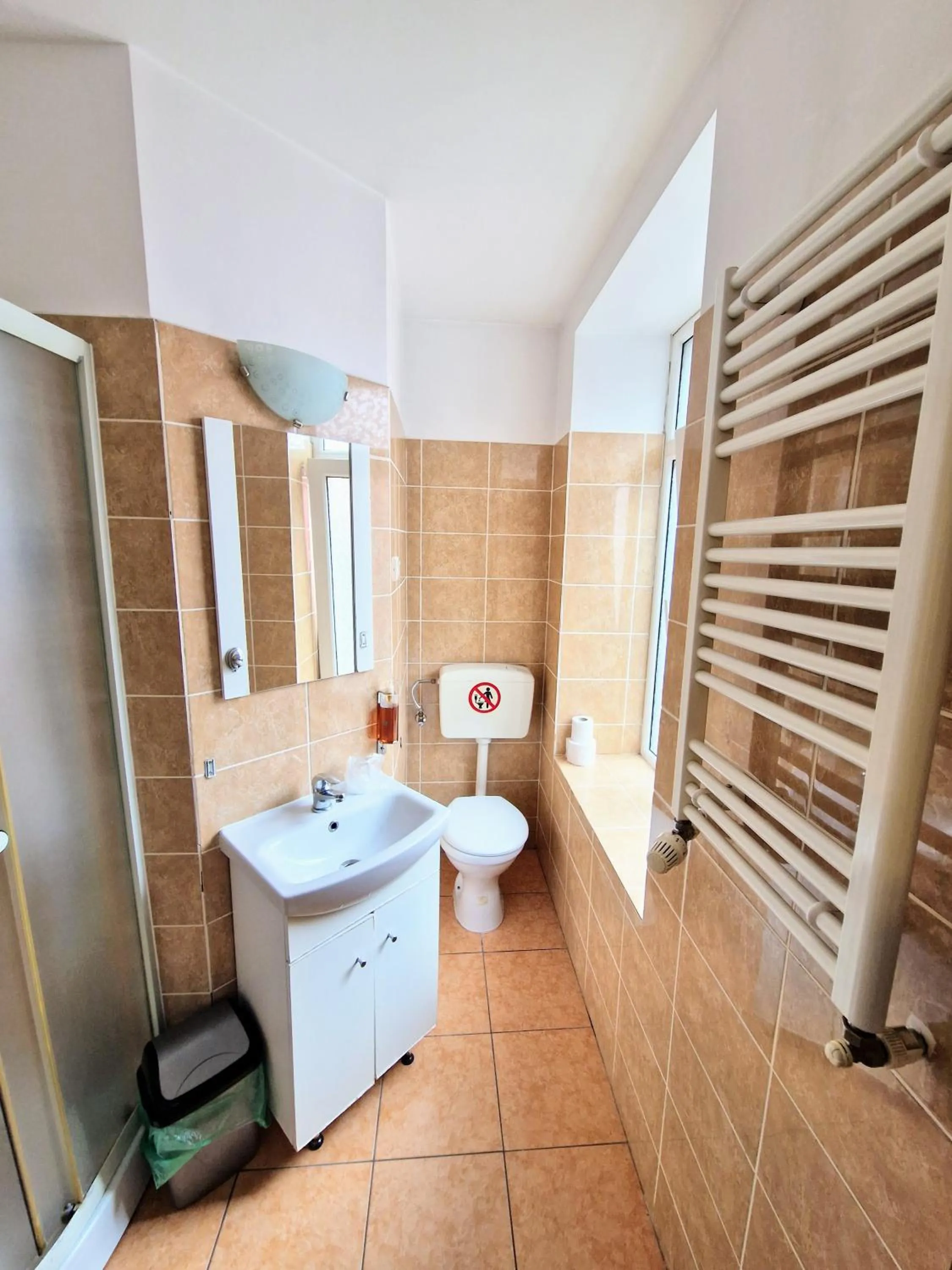 Bathroom in Main Square Apartments & More