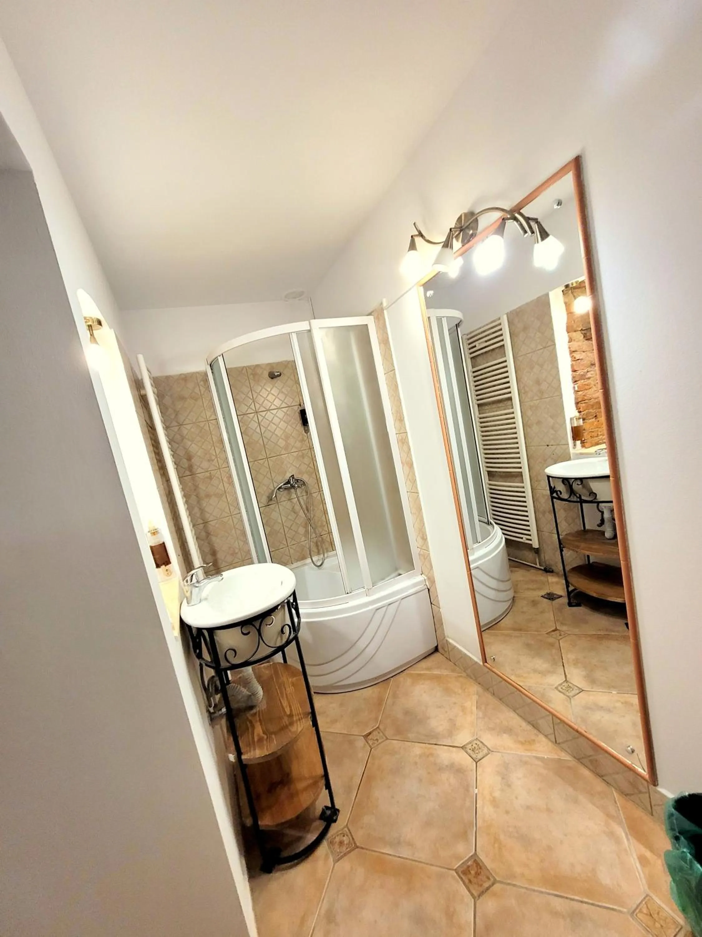 Bathroom, Bed in Main Square Apartments & More