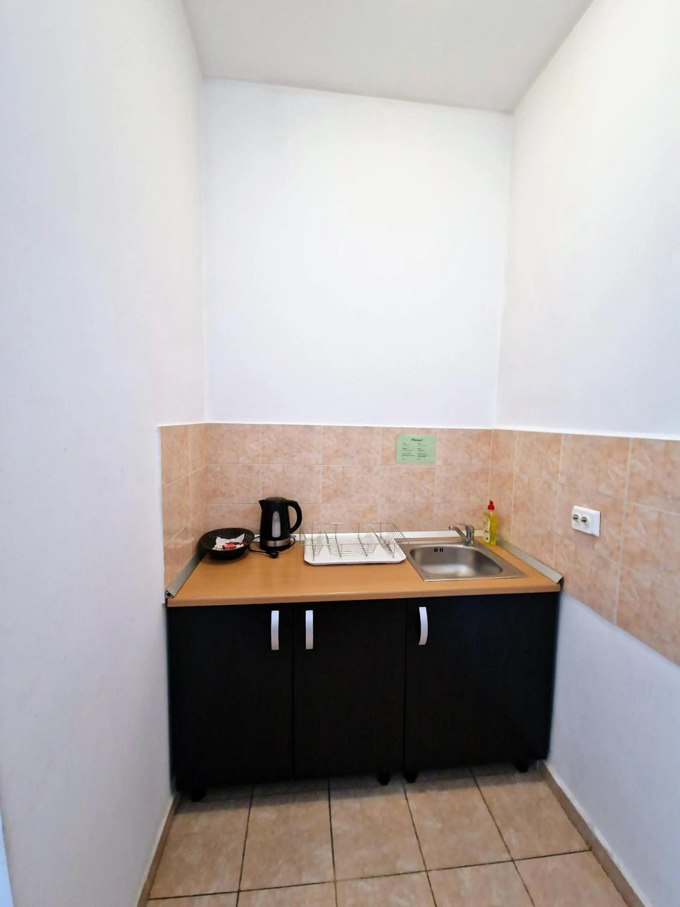 Kitchen or kitchenette in Main Square Apartments & More