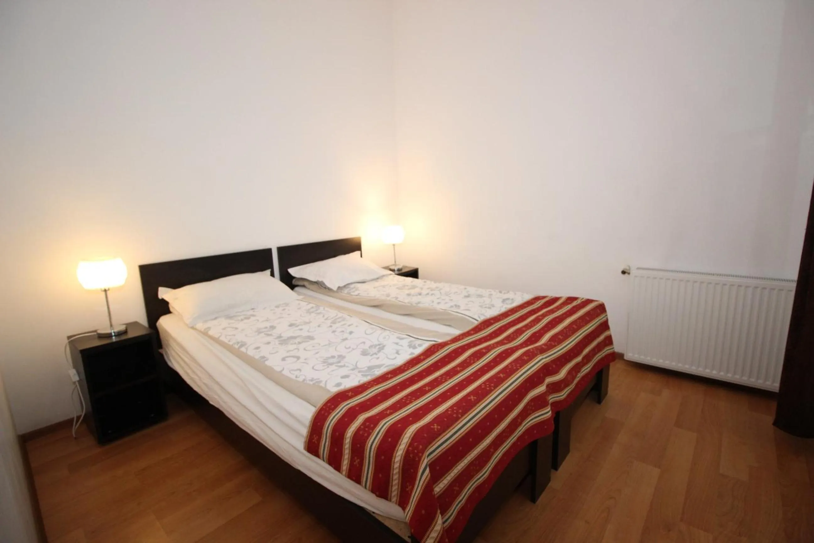 Bedroom, Bed in Main Square Apartments & More