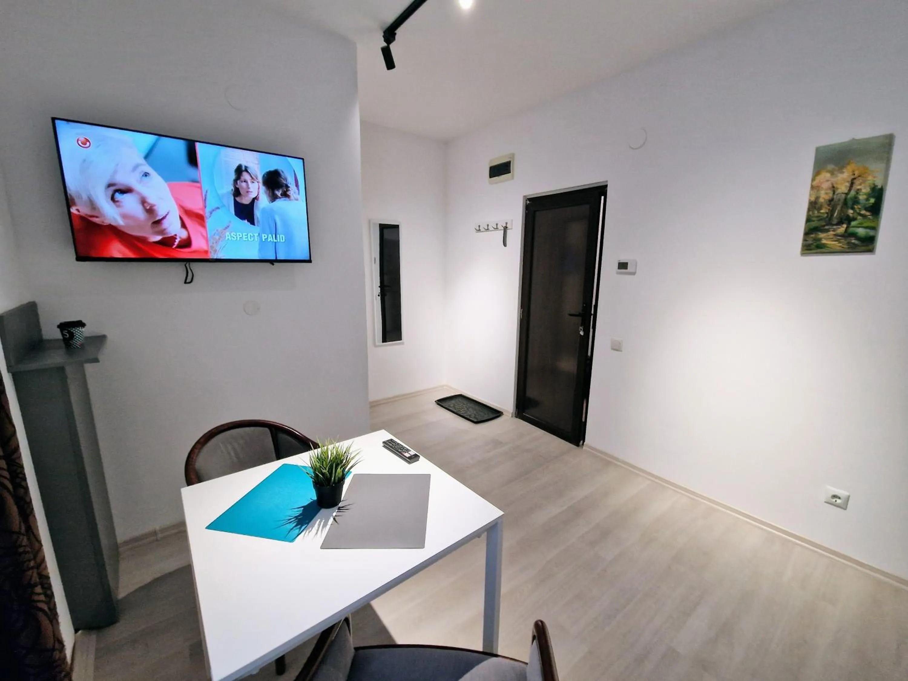 TV and multimedia in Main Square Apartments & More
