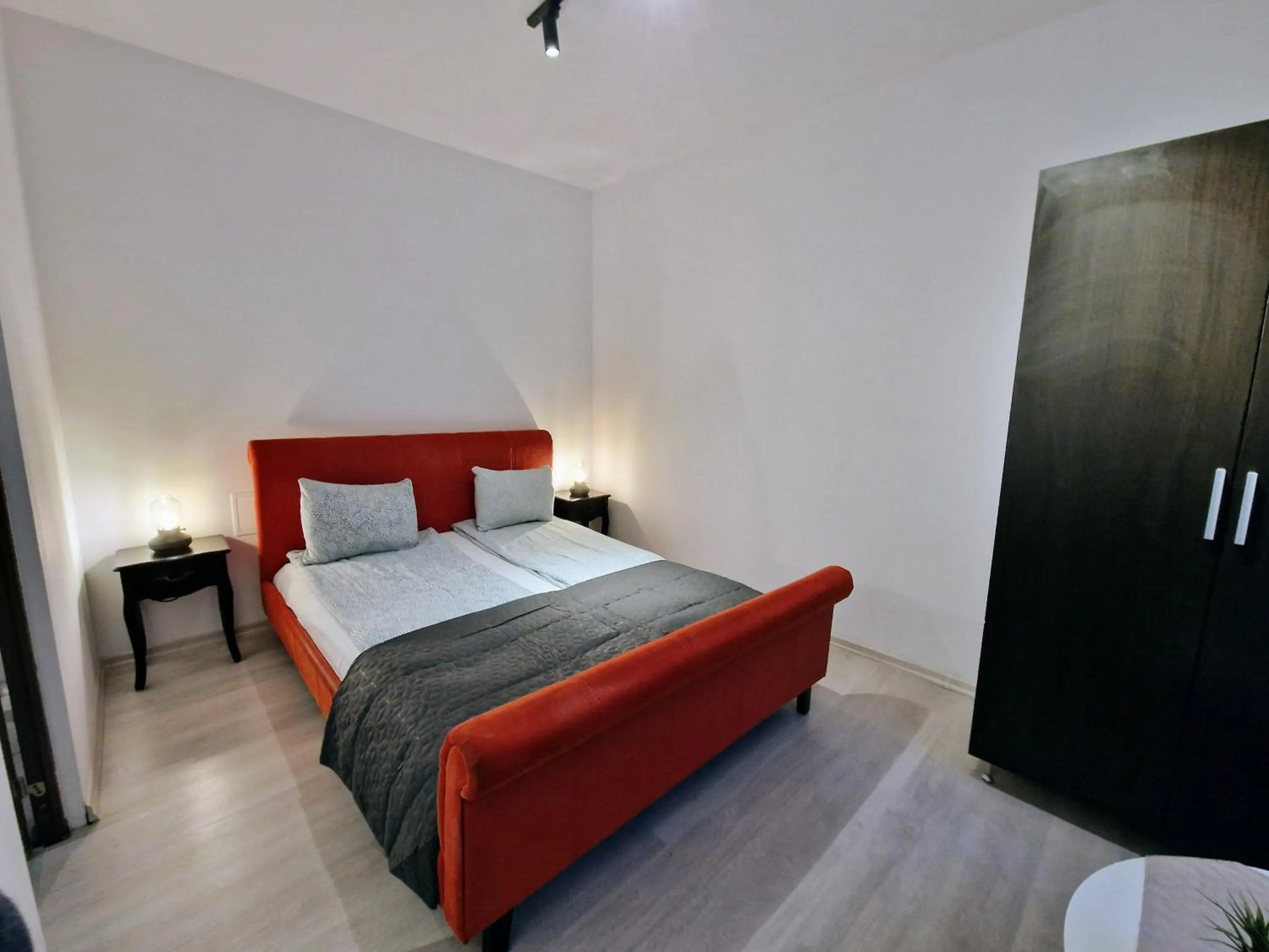 Bedroom, Bed in Main Square Apartments & More