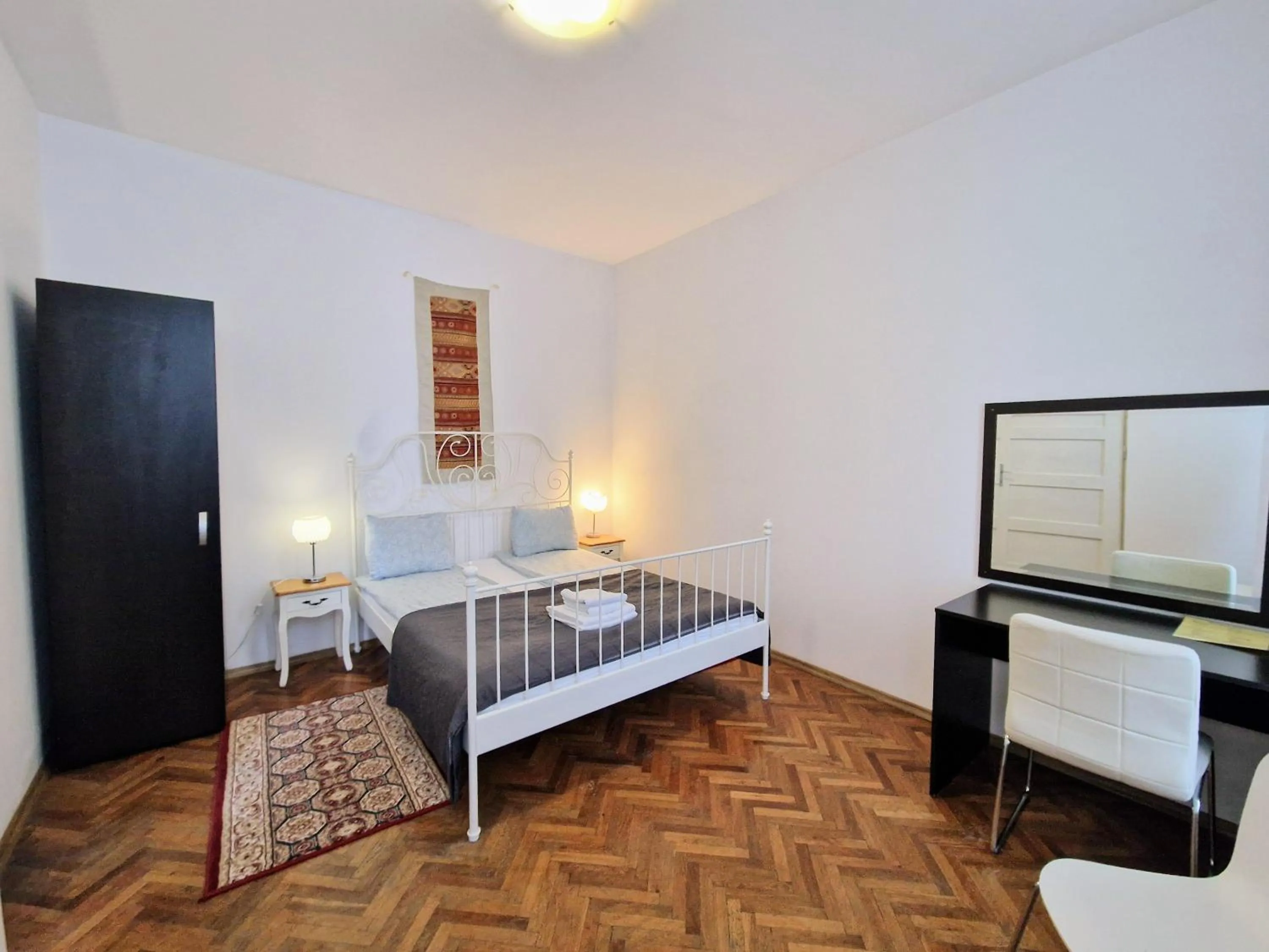 Bedroom, Bed in Main Square Apartments & More