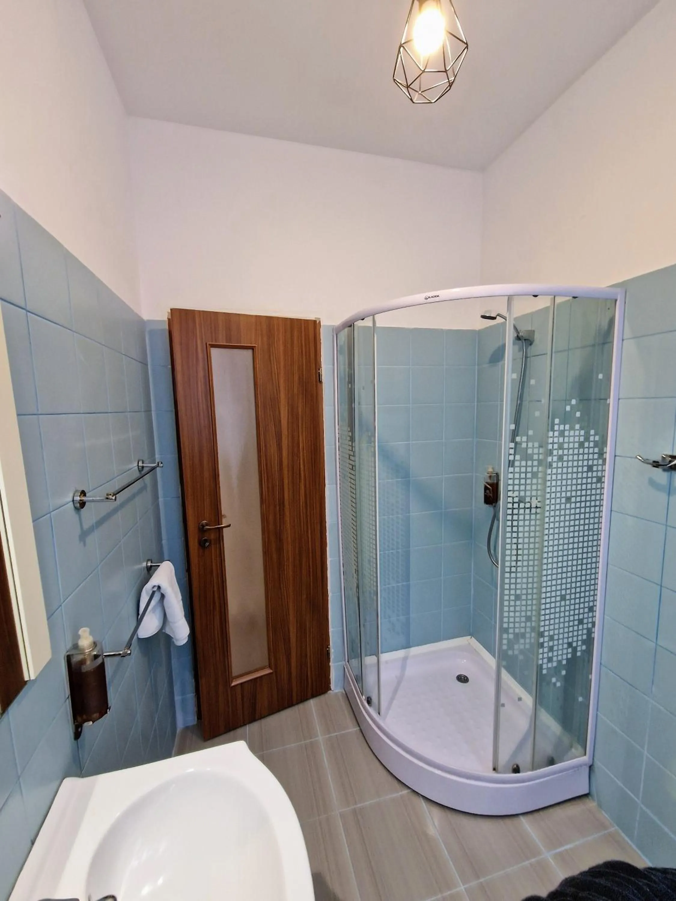 Shower in Main Square Apartments & More
