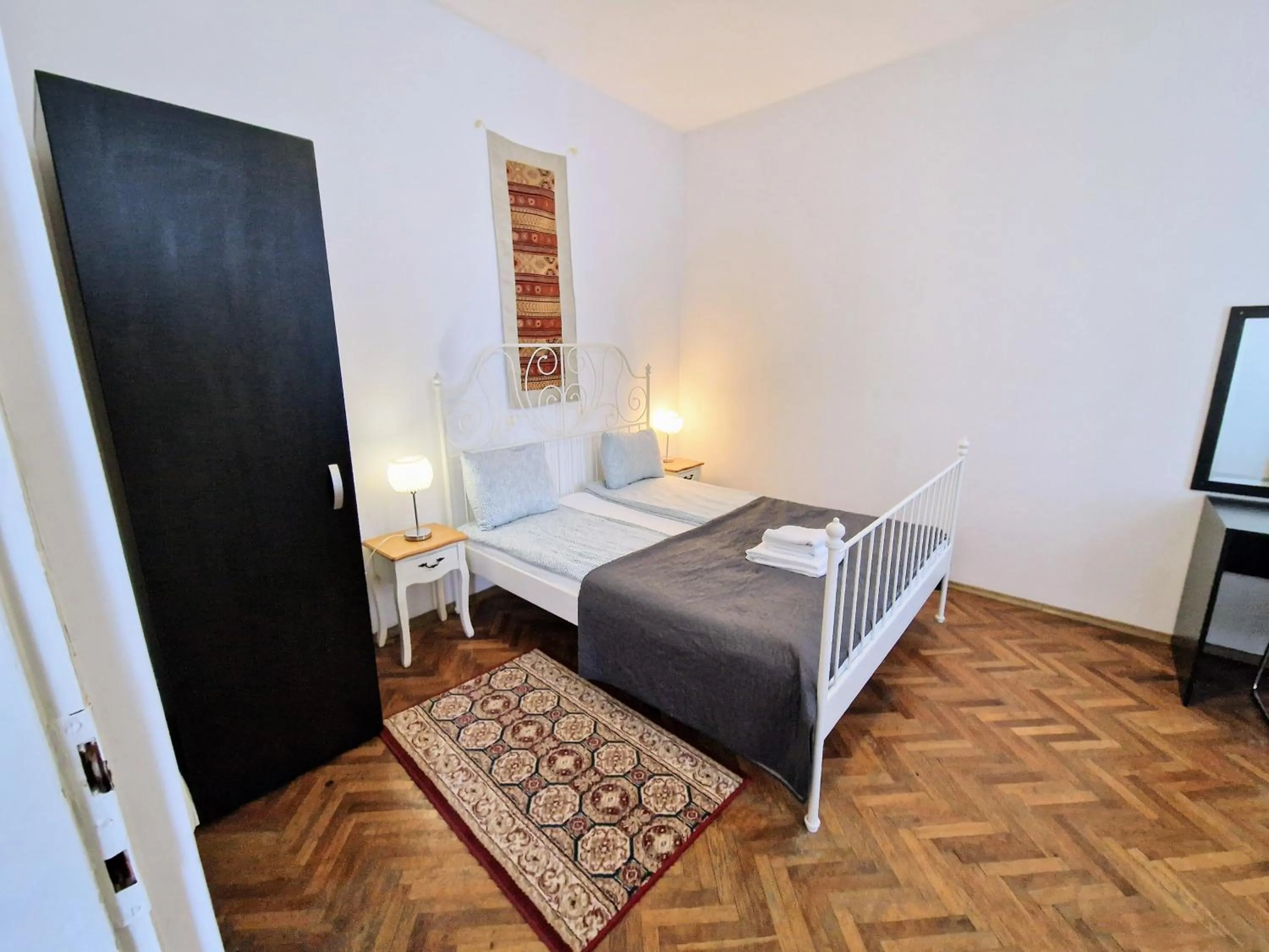 Bedroom, Bed in Main Square Apartments & More