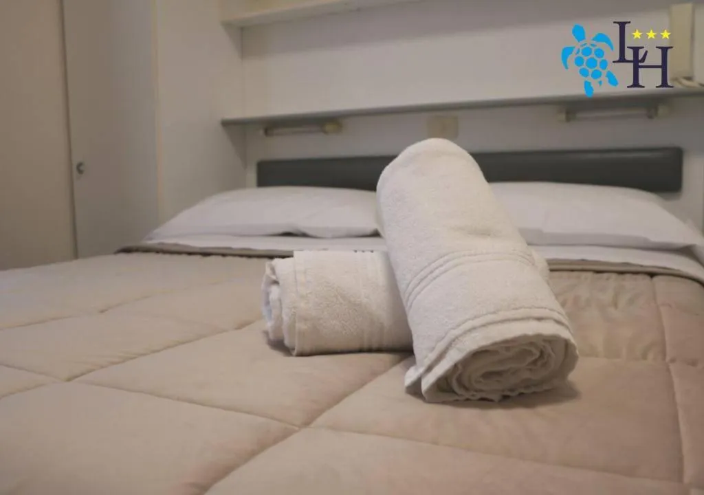 Bed in Hotel Lora RDA Luxury