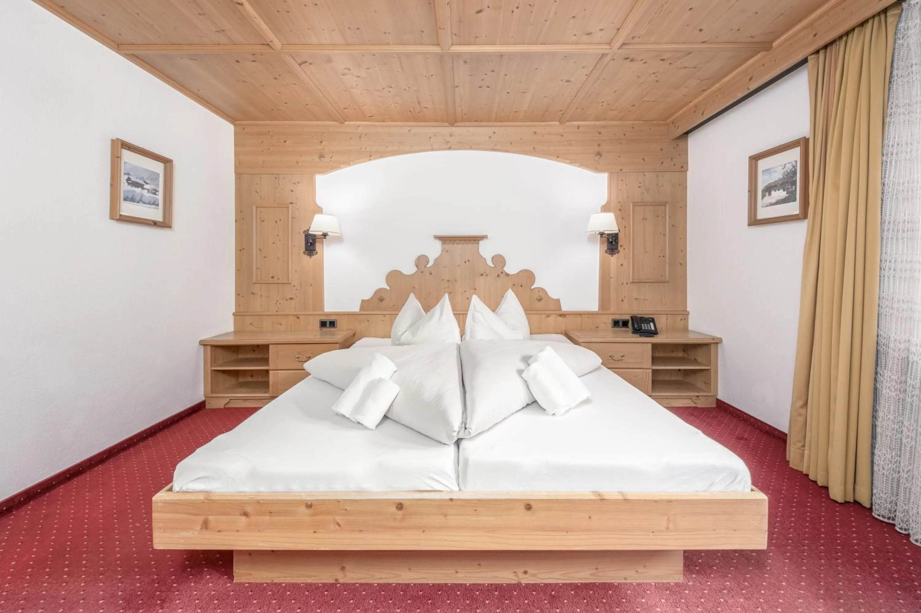 Bed in Alpenhotel Tirolerhof Gerlos