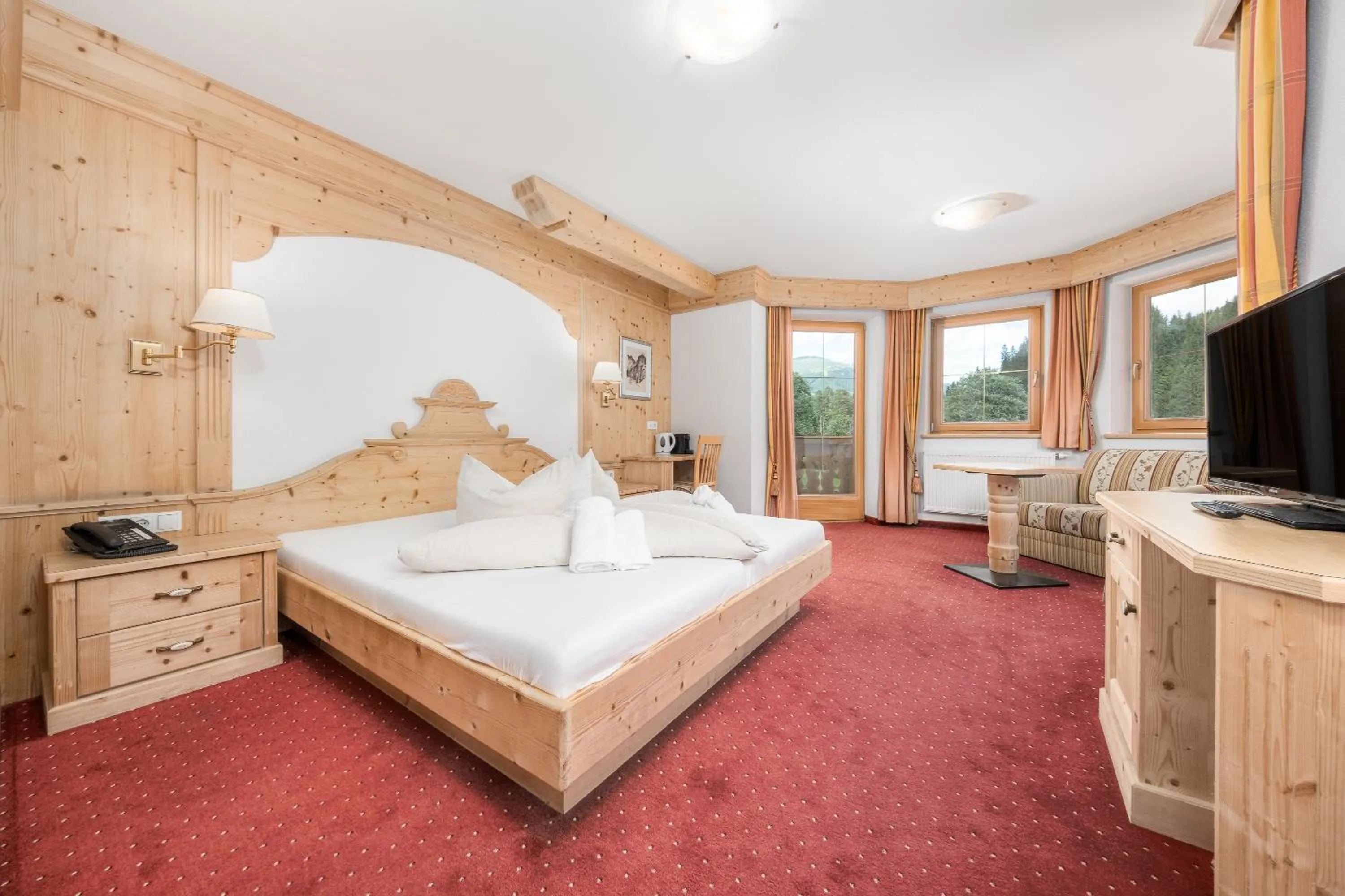 Bed in Alpenhotel Tirolerhof Gerlos