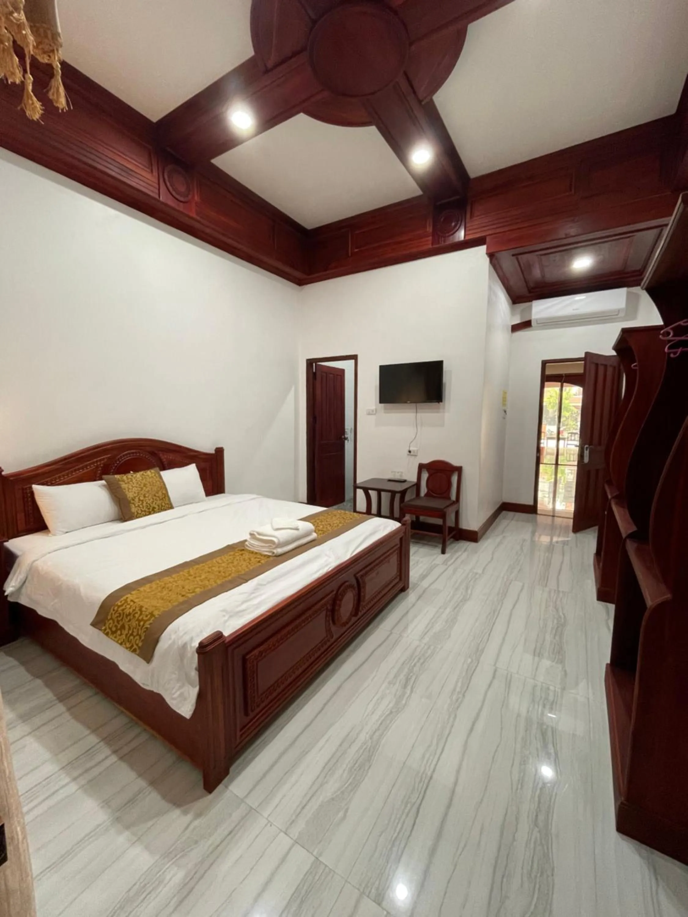 Photo of the whole room, Bed in PhaiLin Hotel