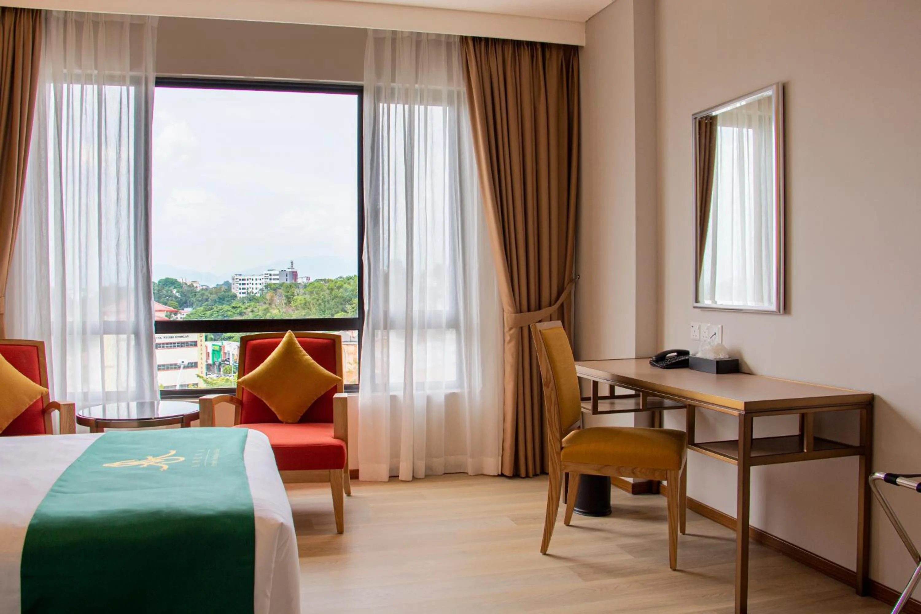 Bed in Arena Premier Hotel