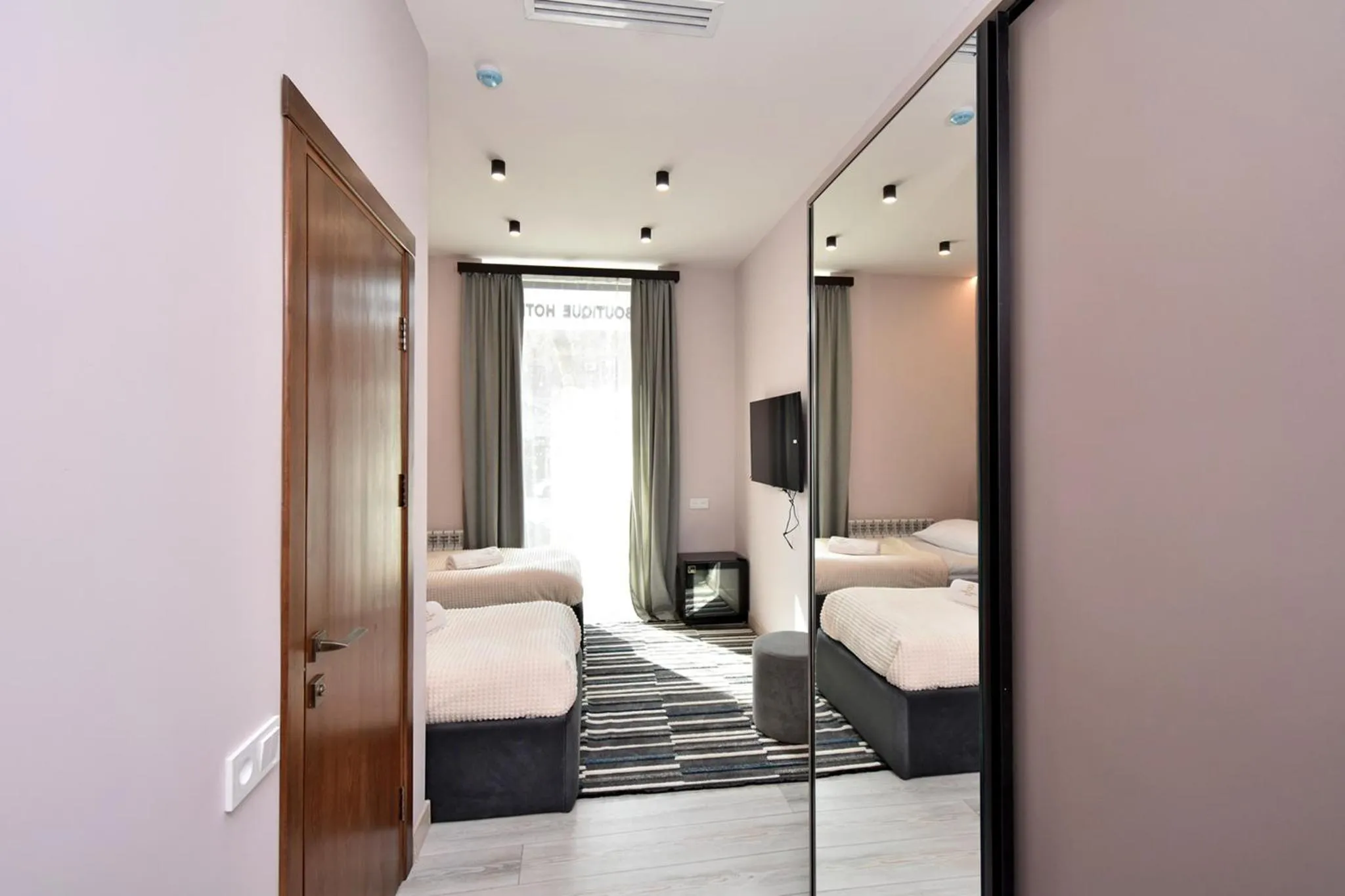 Bed in Avenue 23 Boutique Hotel