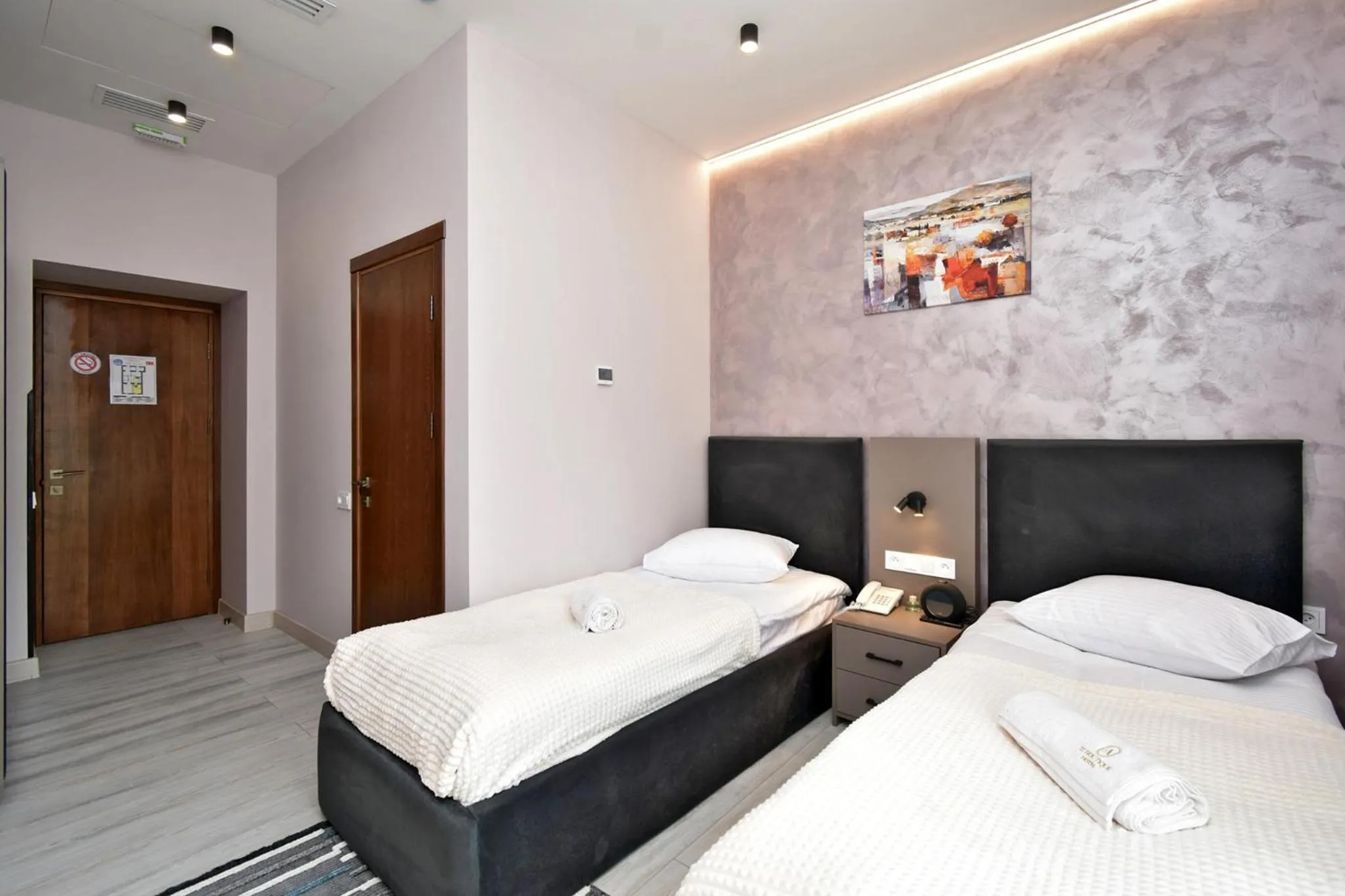 Bed in Avenue 23 Boutique Hotel