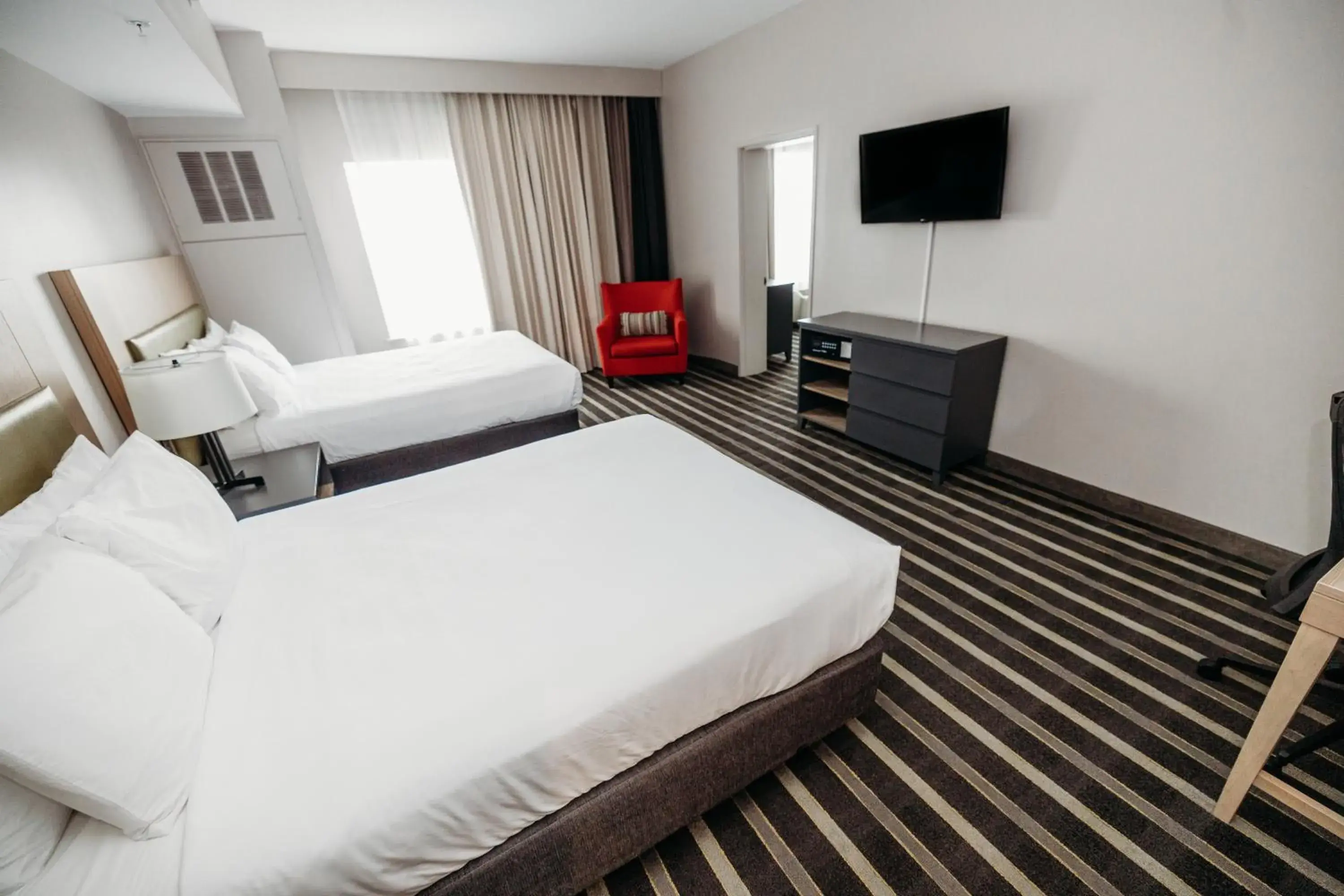 Two-Bedroom Suite with Two Queen and One King Bed with Sofa Bed - Non-Smoking in Parkview Inn & Suites, Lancaster Amish Country, PA Two-Bedroom Suite with Two Queen and One King Bed with Sofa Bed - Non-Smoking in Parkview Inn & Suites, Lancaster Amish Country, PA