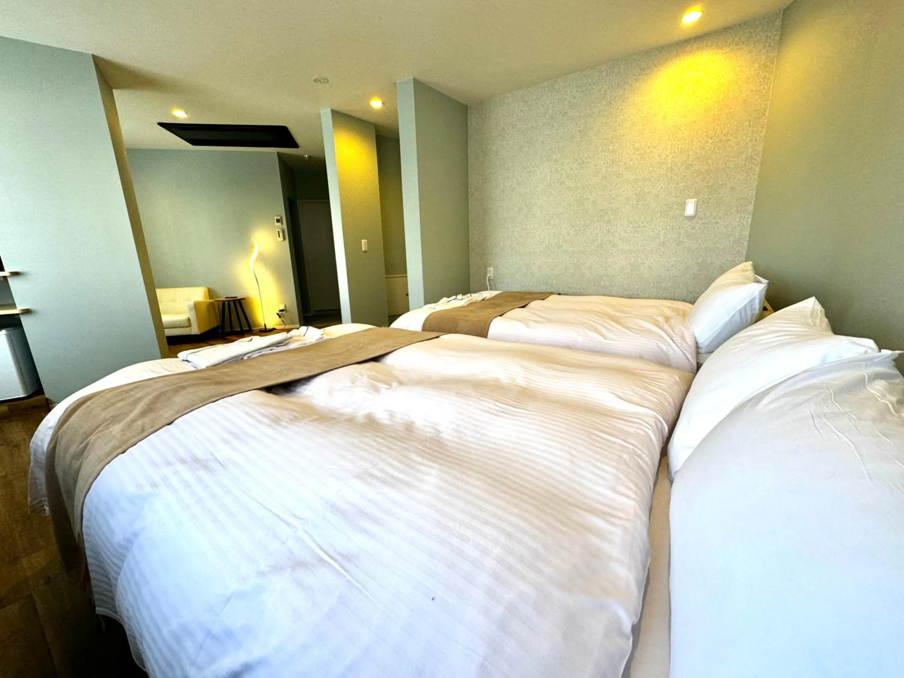 Bed in Beppu onsen Resort Stay Spa Tsurumi