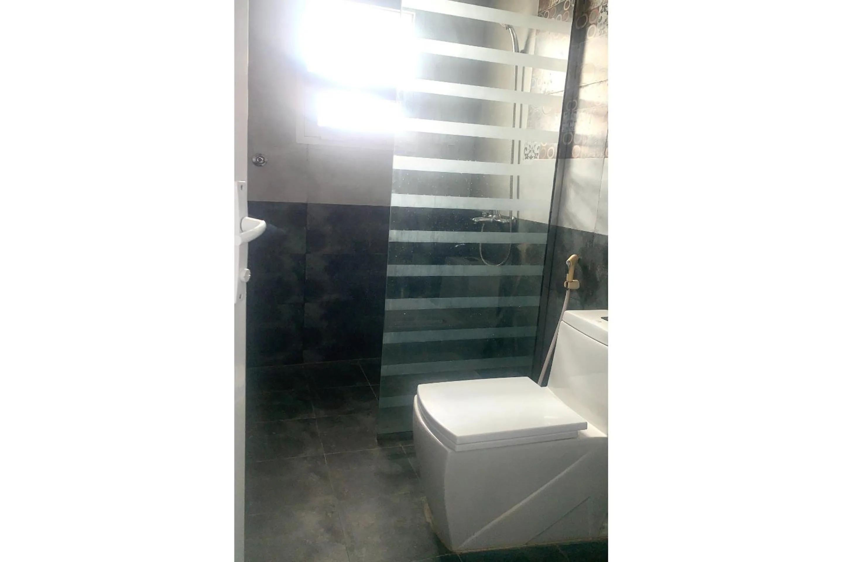 Bathroom in OYO 157 Dream Barka Hotel