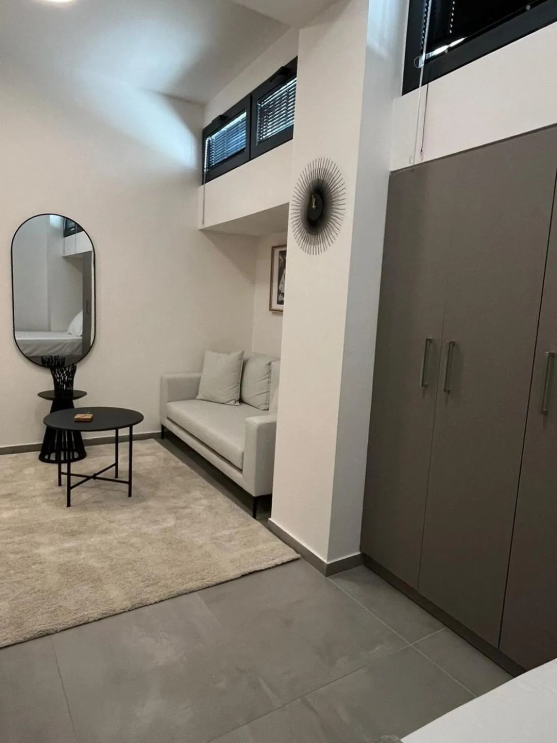 Bed in AIONION RESIDENCES by K&K