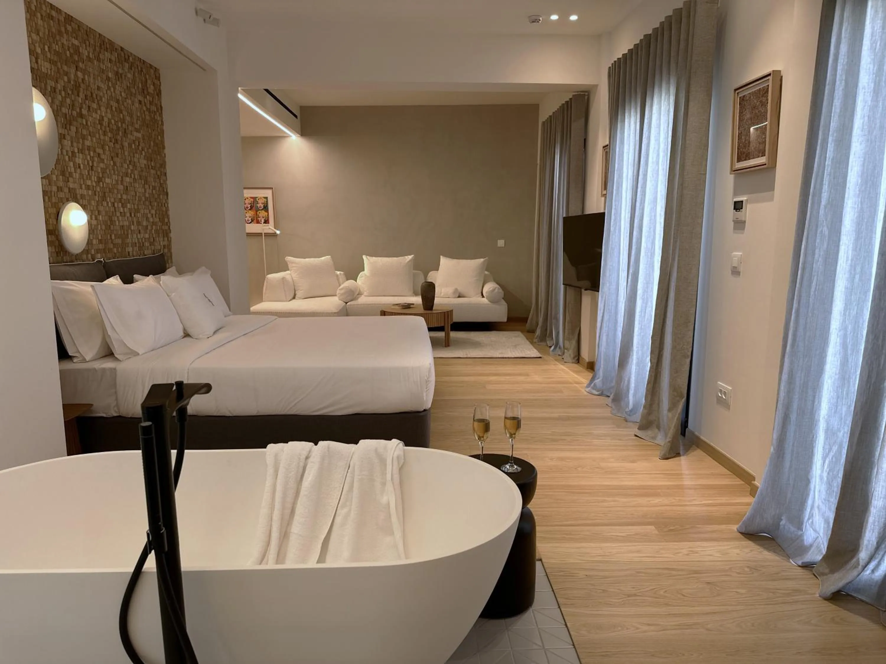 Bed in AIONION RESIDENCES by K&K