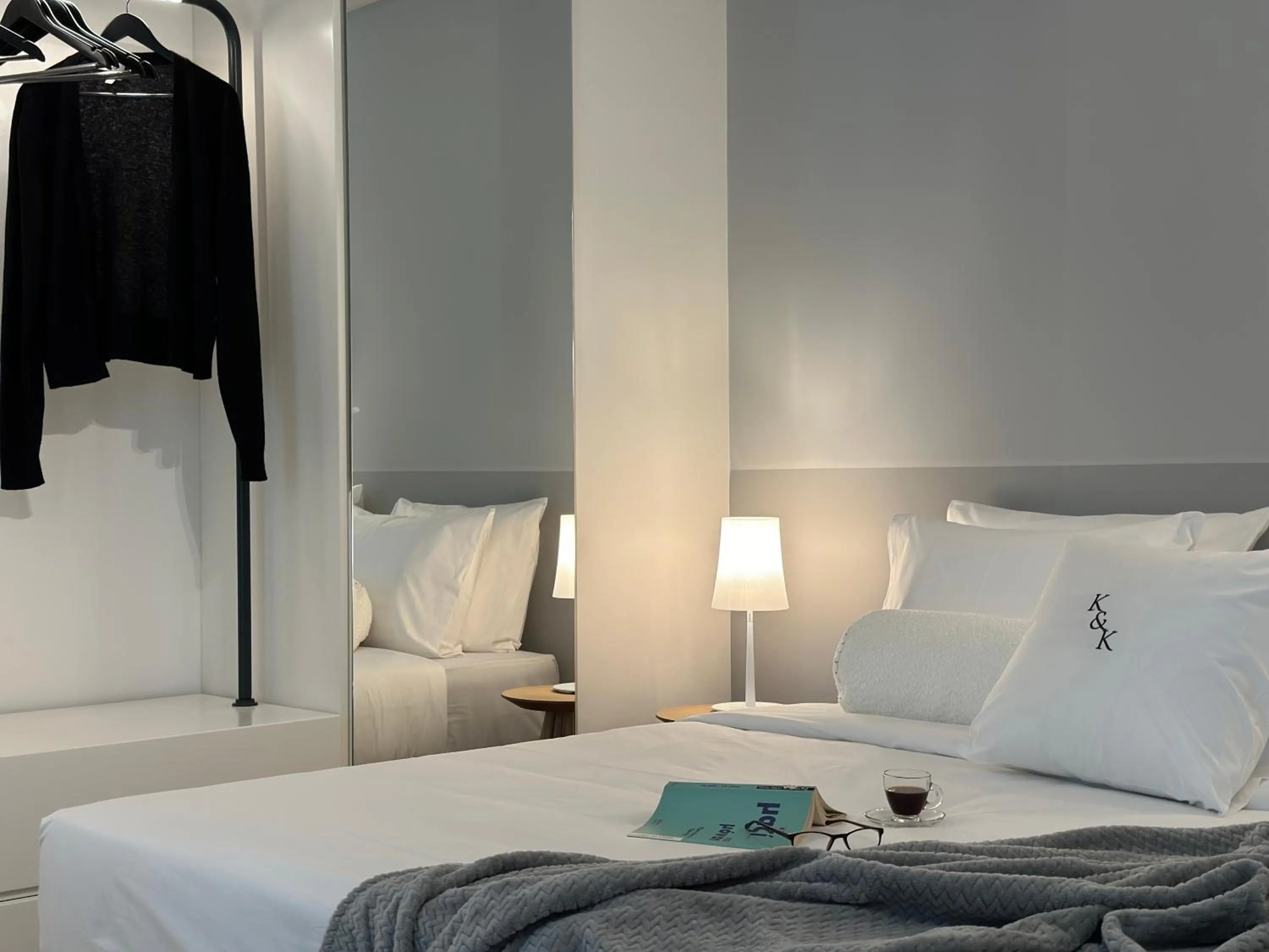 Bed in AIONION RESIDENCES by K&K