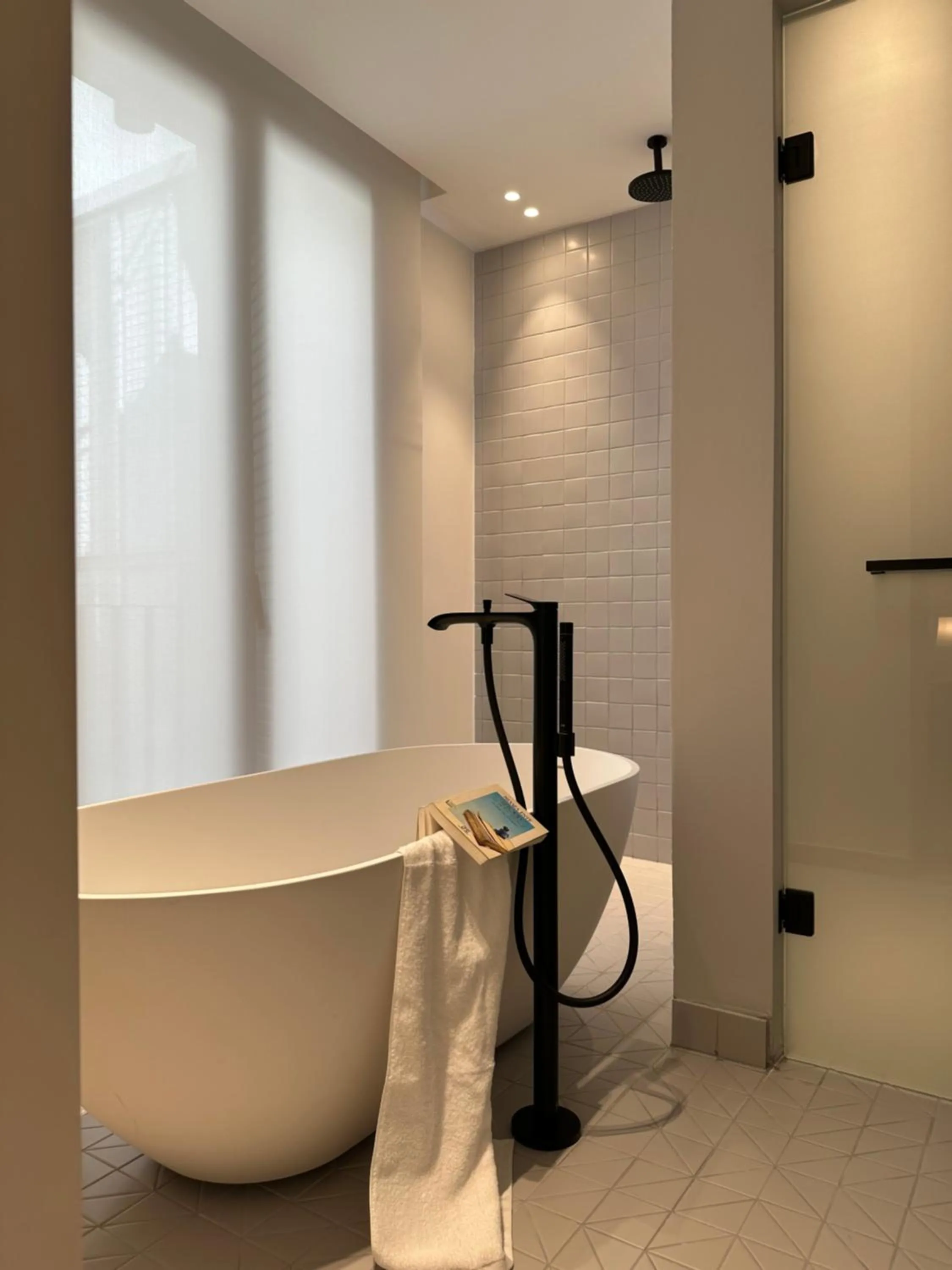 Bathroom in AIONION RESIDENCES by K&K