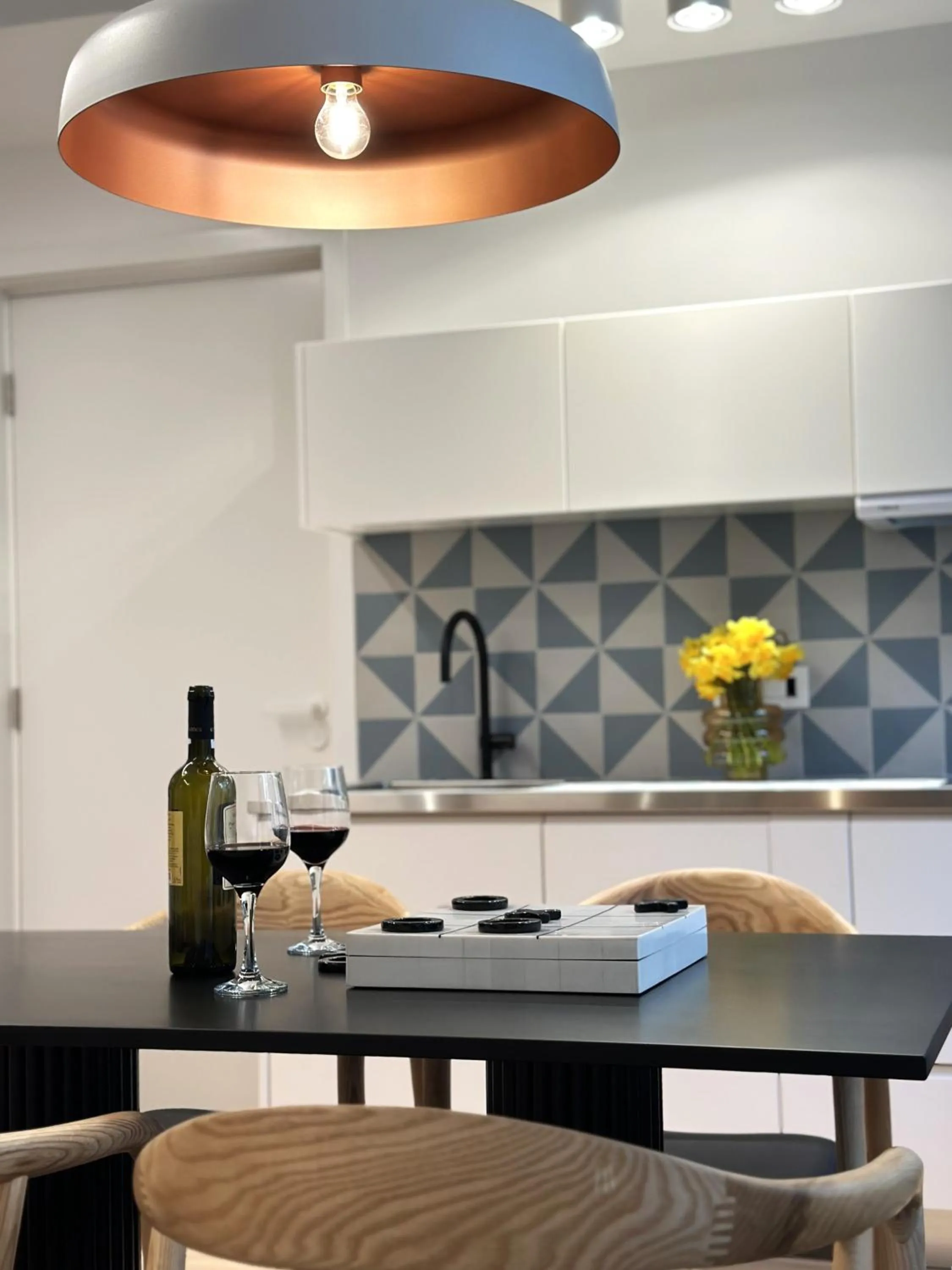 Kitchen or kitchenette in AIONION RESIDENCES by K&K