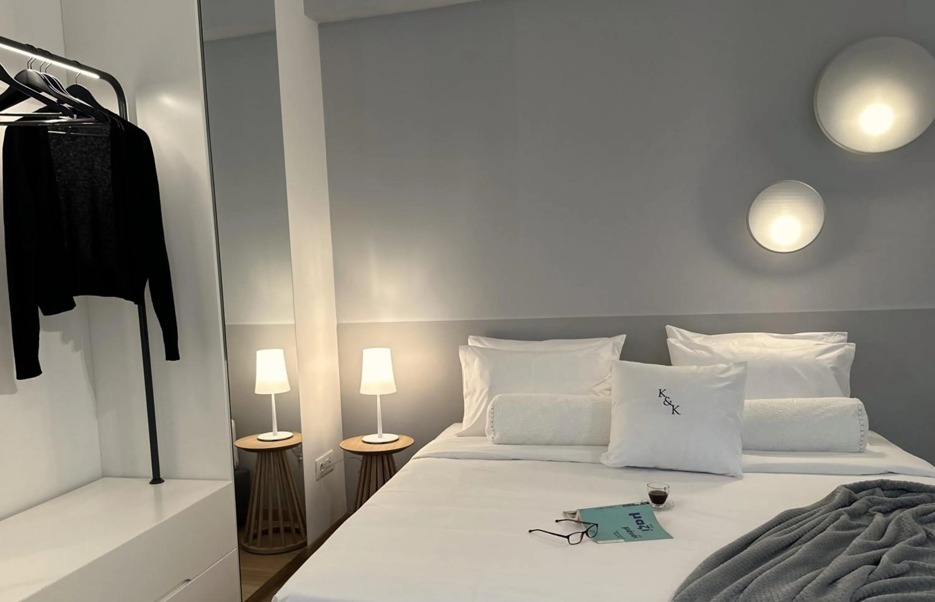 Bed in AIONION RESIDENCES by K&K